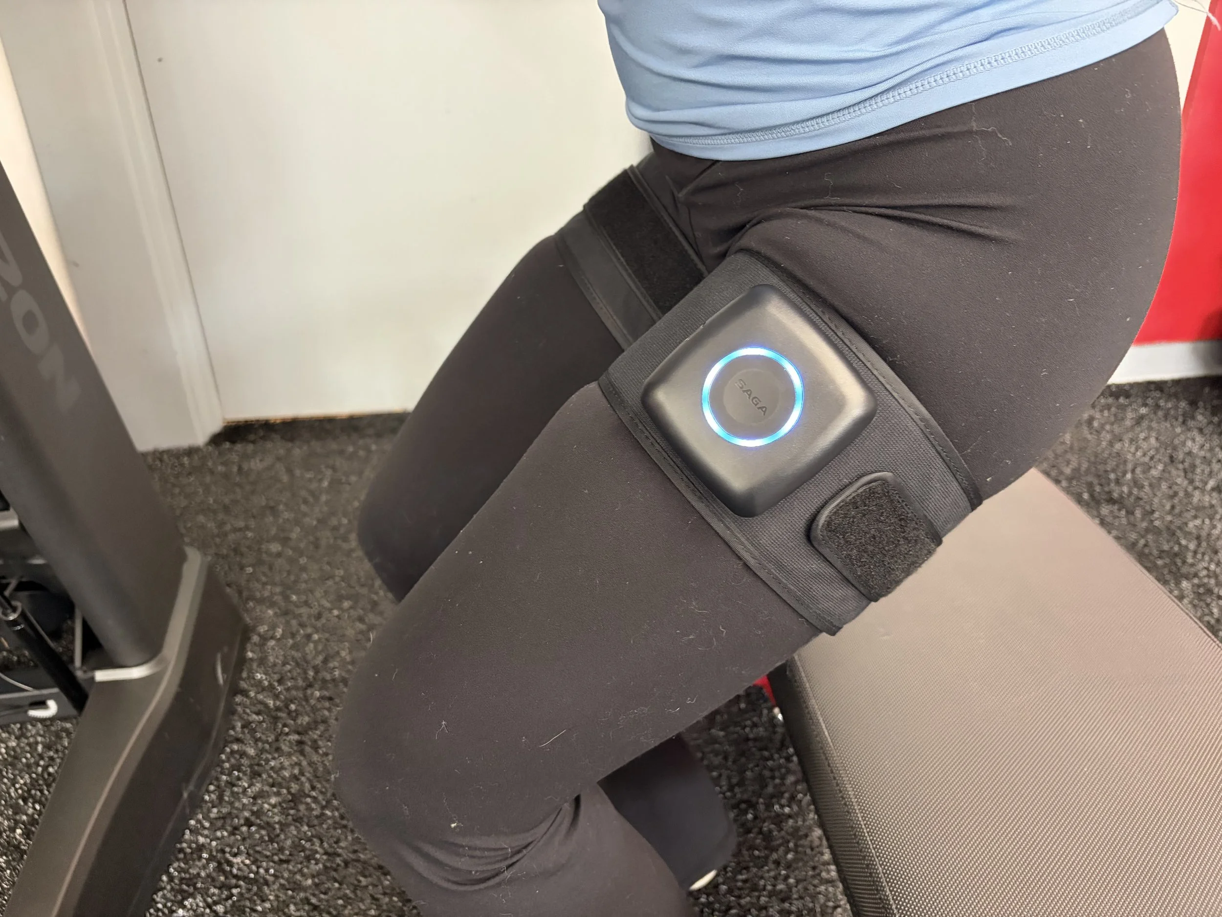 A patient performing BFR (Blood flow restriction training).