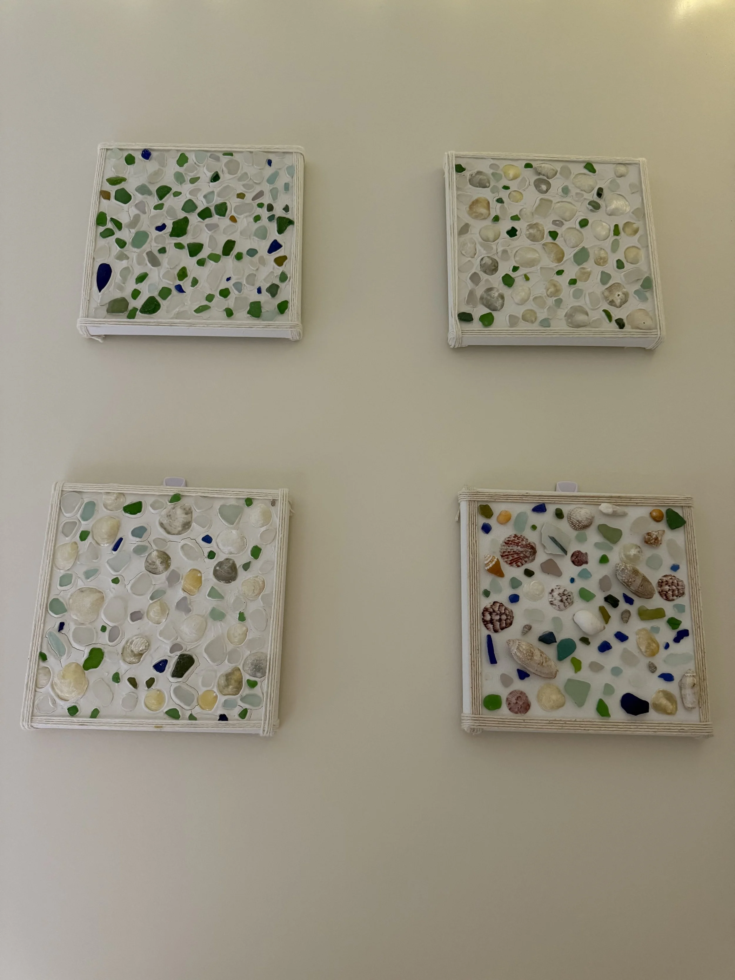 Canvases made from seaglass and shells