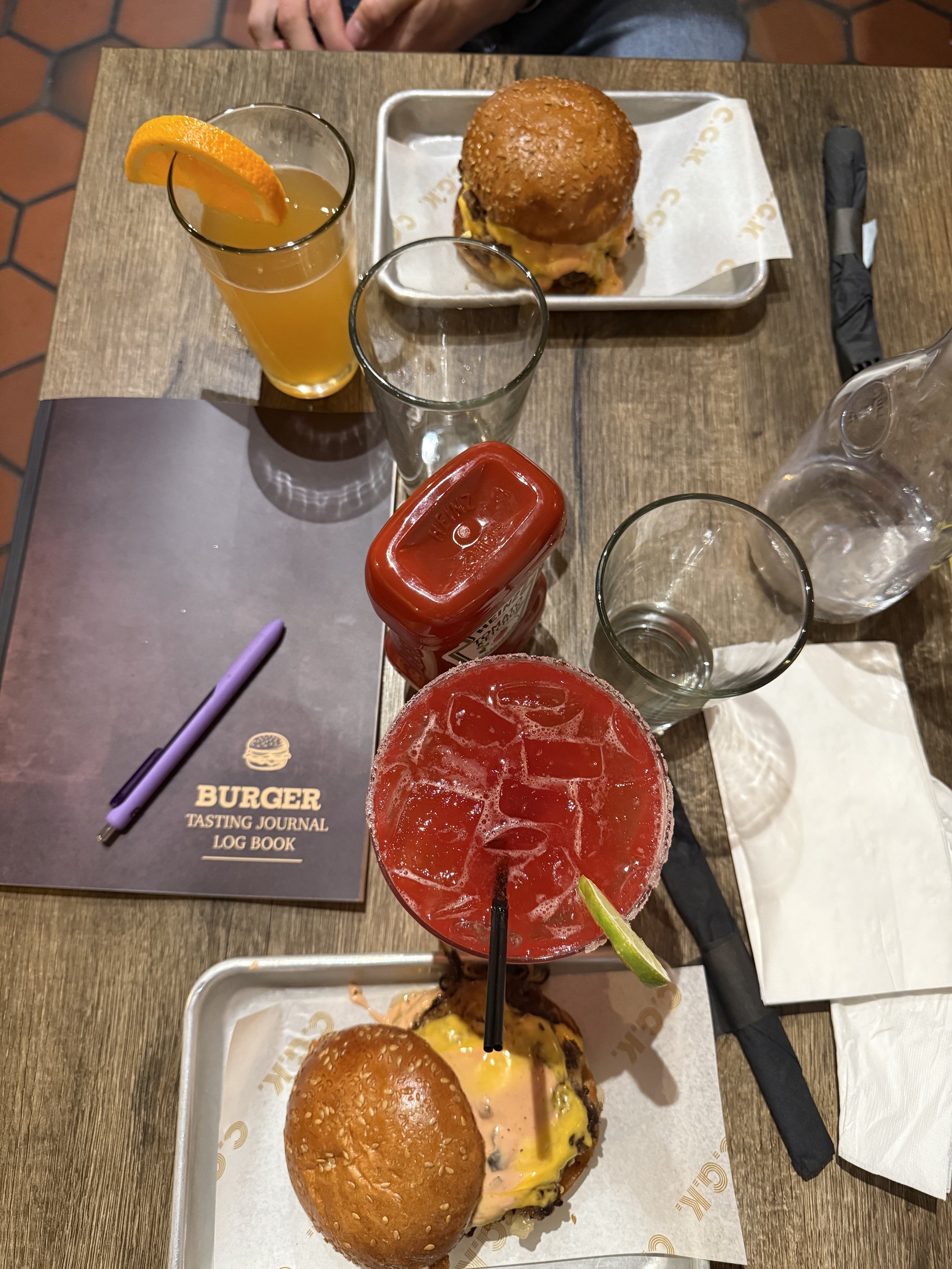 2 burgers on a table