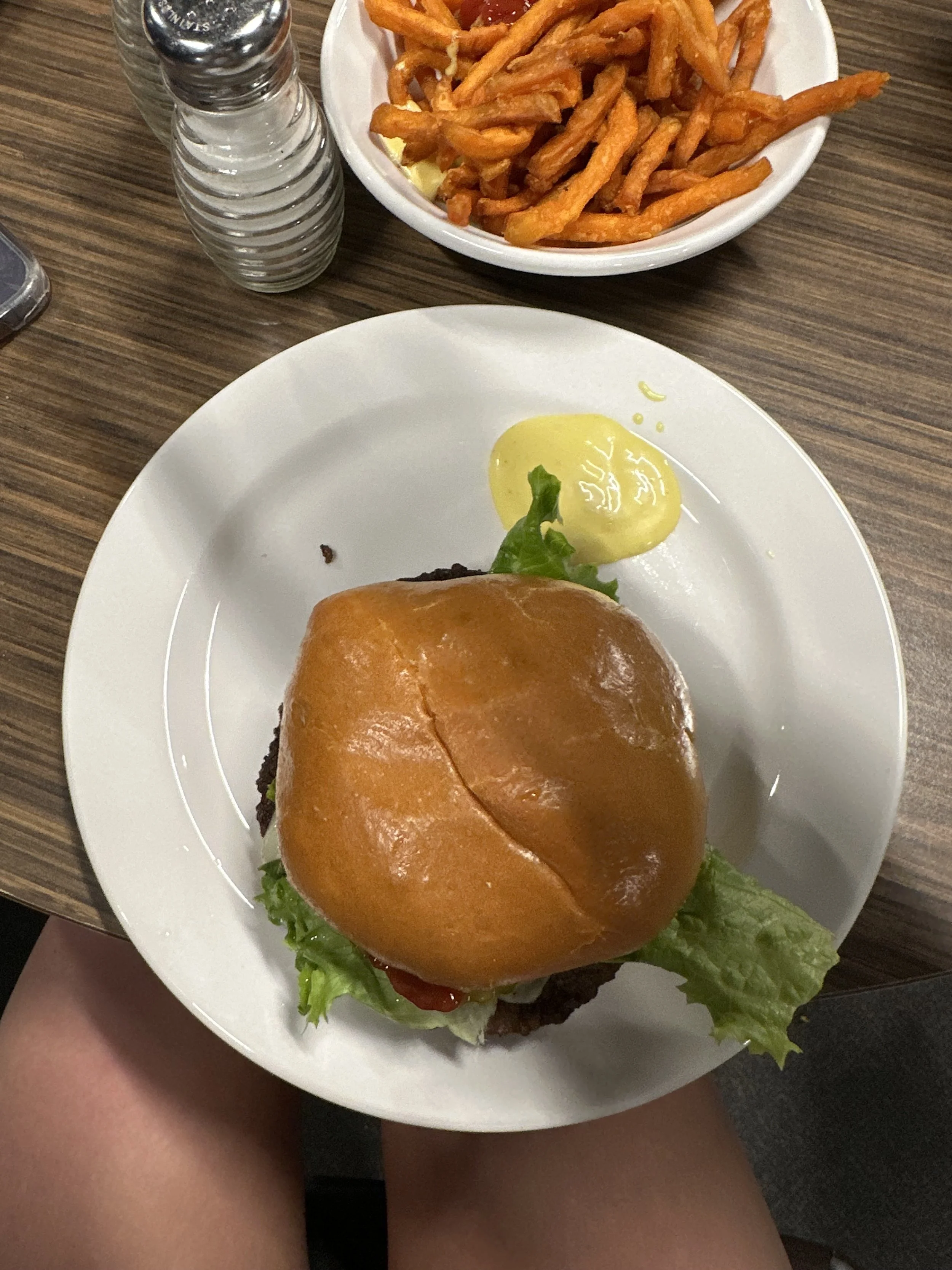 a burger with honey mustard sauce