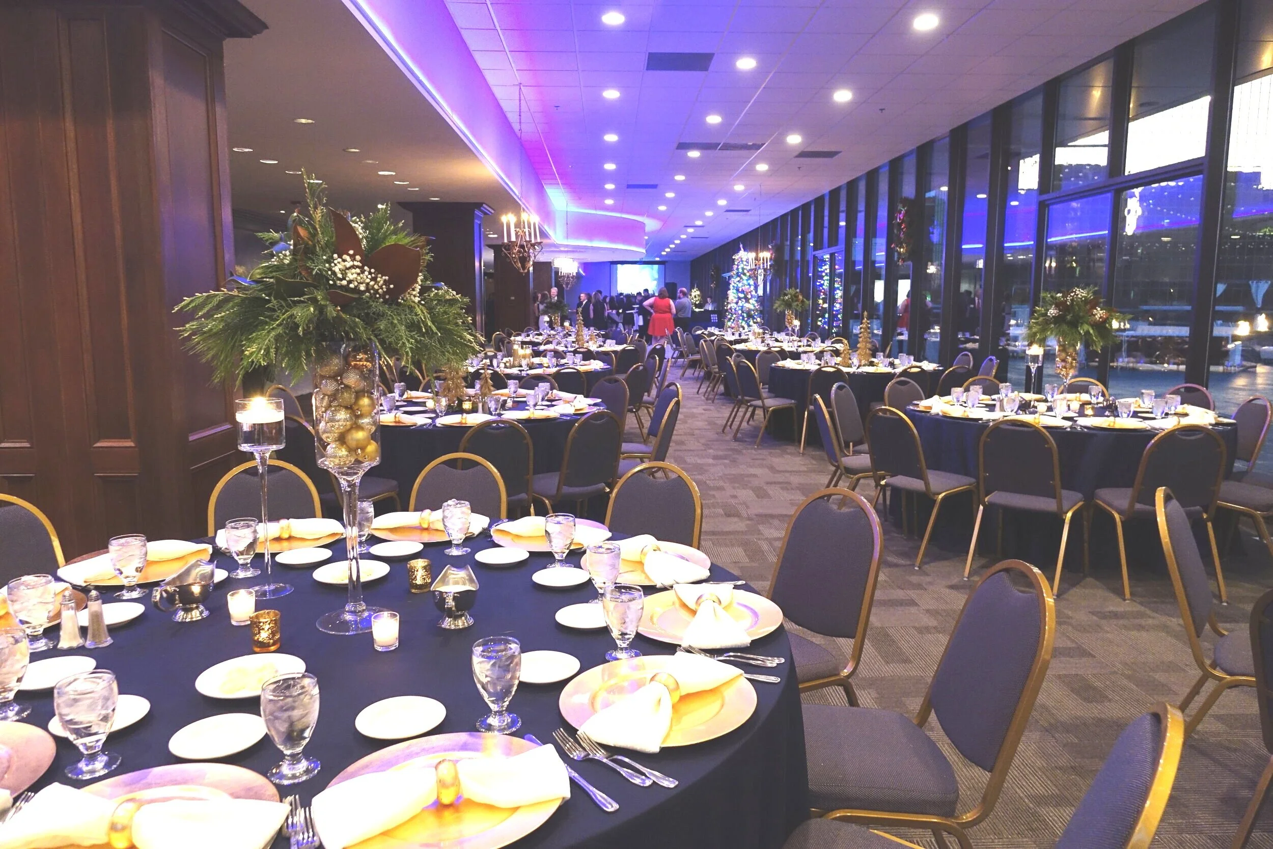 Tailored corporate tablescape at JPS Events at Regions Tower, featuring chef-driven in-house catering settings, specialized decor, and all-inclusive full-service execution
