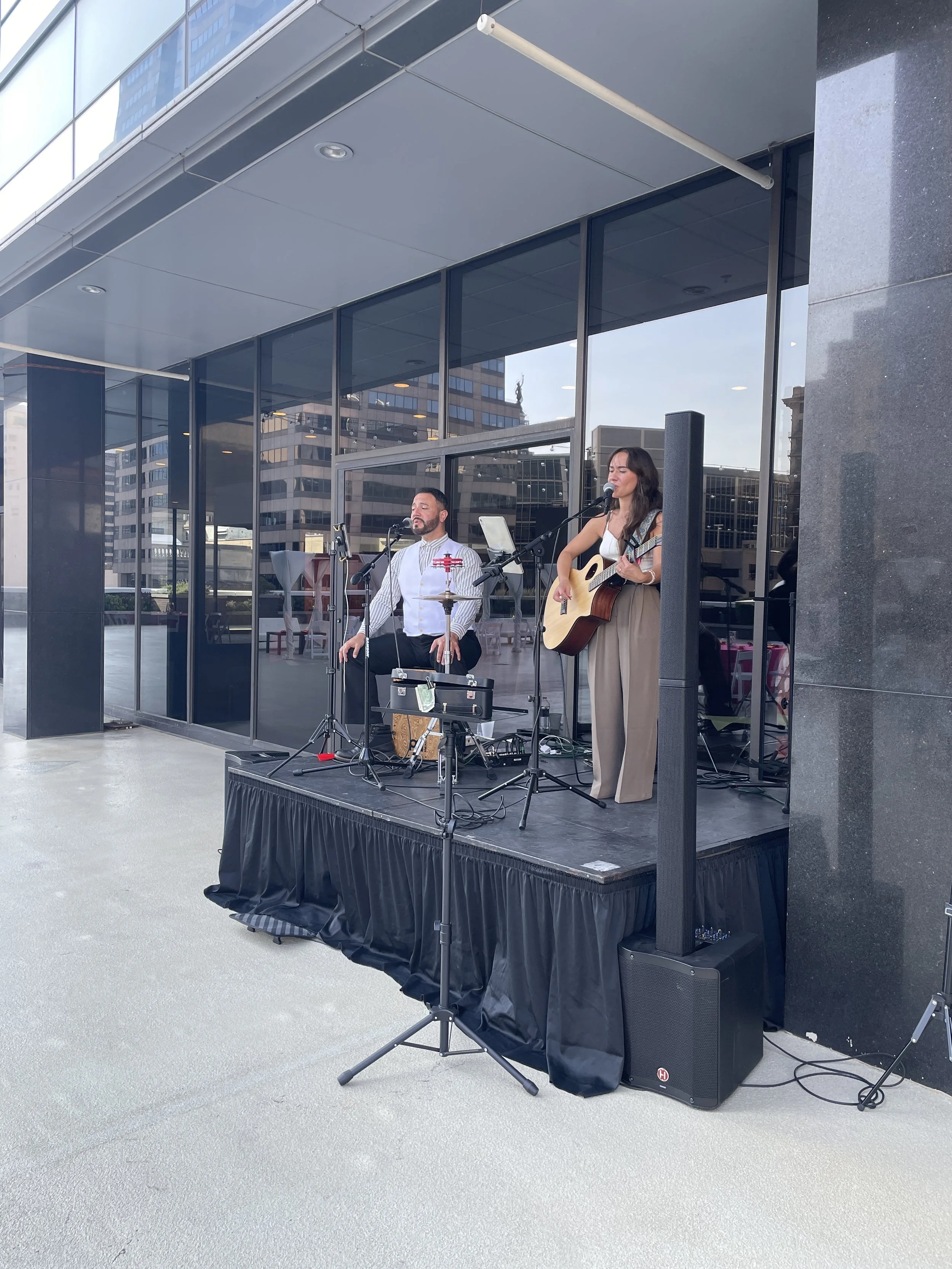 Live musical performance setup on the outdoor terrace at JPS Events at Regions Tower, demonstrating full-service event management, built-in entertainment coordination, and private elevated outdoor event space in downtown Indianapolis.