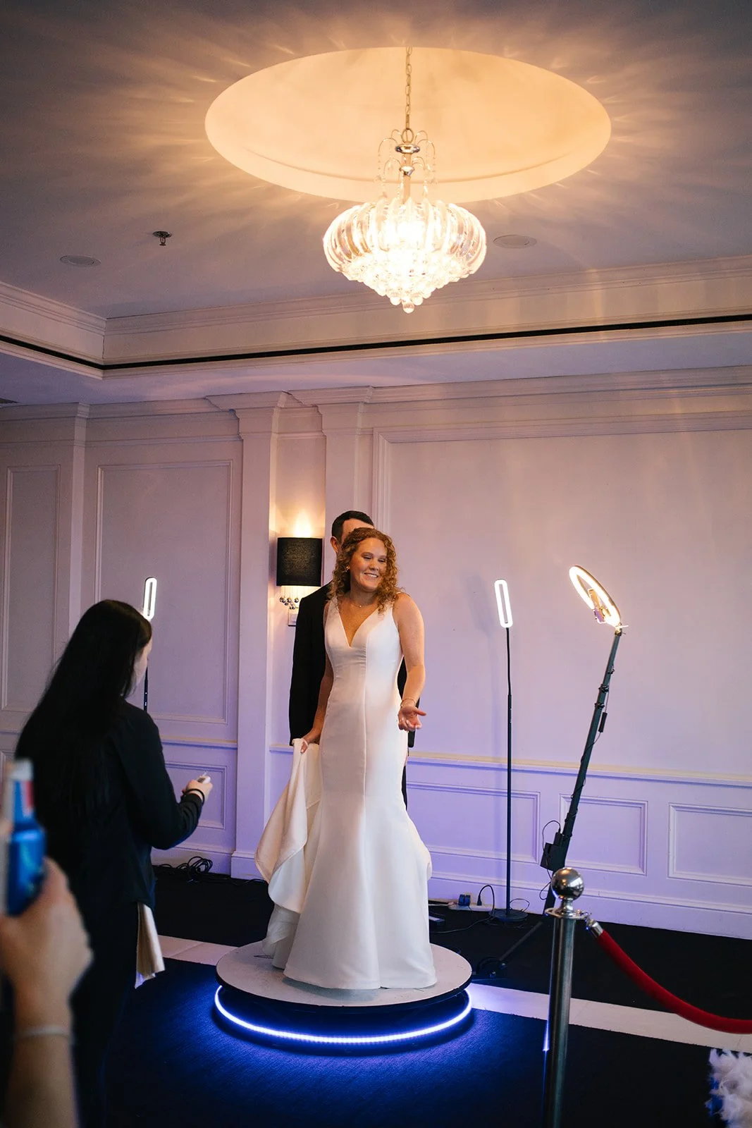 360 video booth experience on the dance floor at JPS Events at Regions Tower, highlighting built-in AV lighting production, custom reception entertainment, and full-service wedding coordination in downtown Indy.