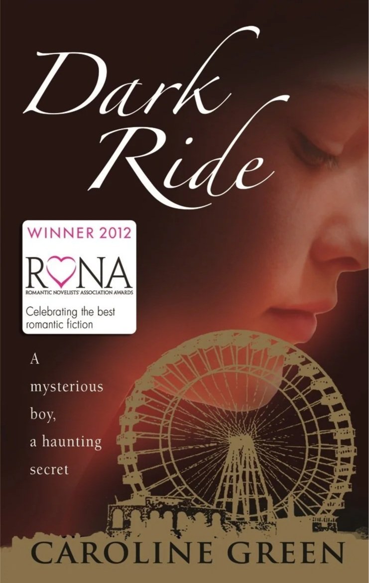Book cover of 'Dark Ride' by Caroline Green, featuring a close-up of a person's face with a faint amusement park Ferris wheel illustration. The cover highlights the book's awards and a tagline about a mysterious boy with a haunting secret.