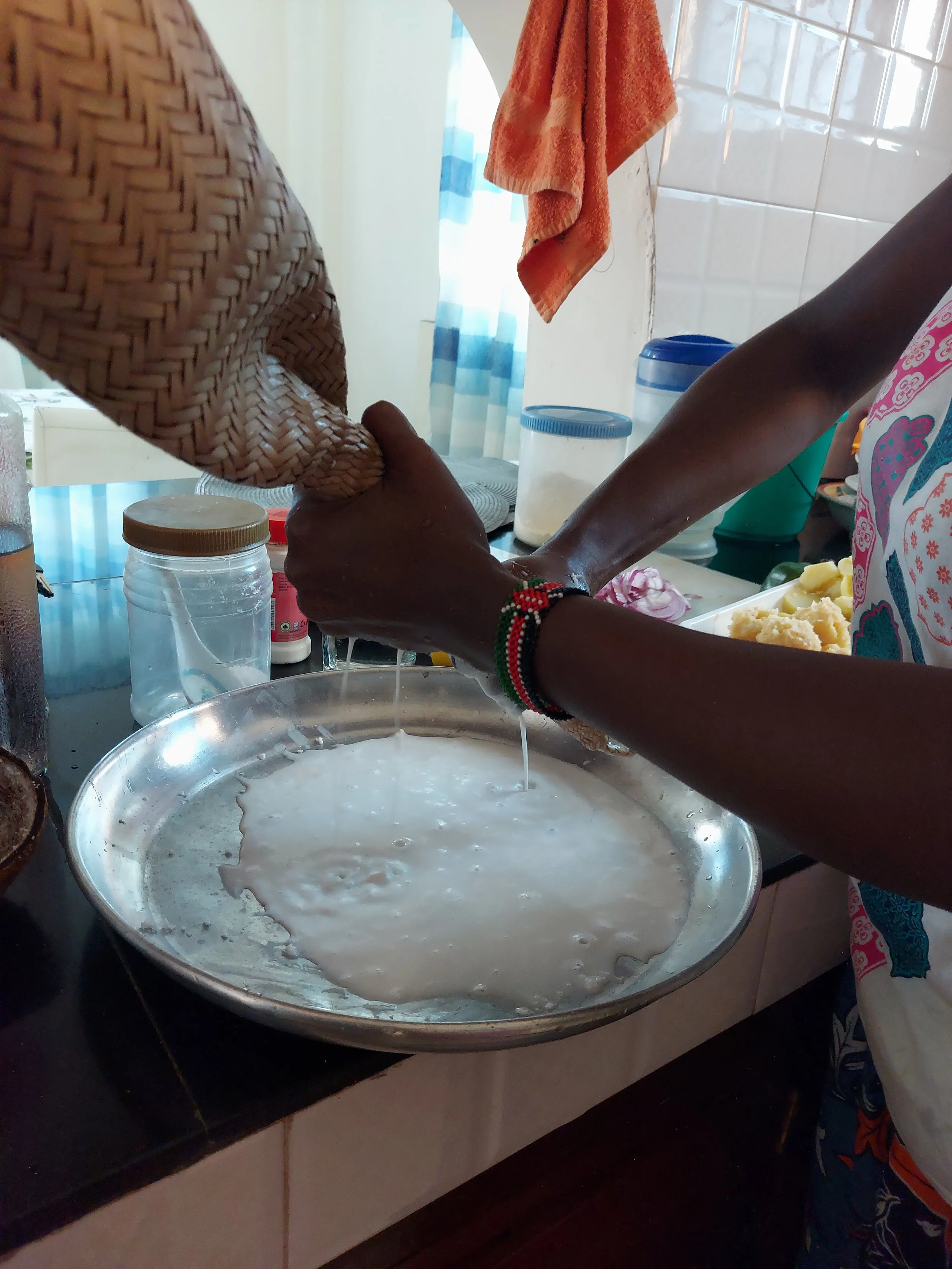 Squeezing out the milk using a Kifumbu