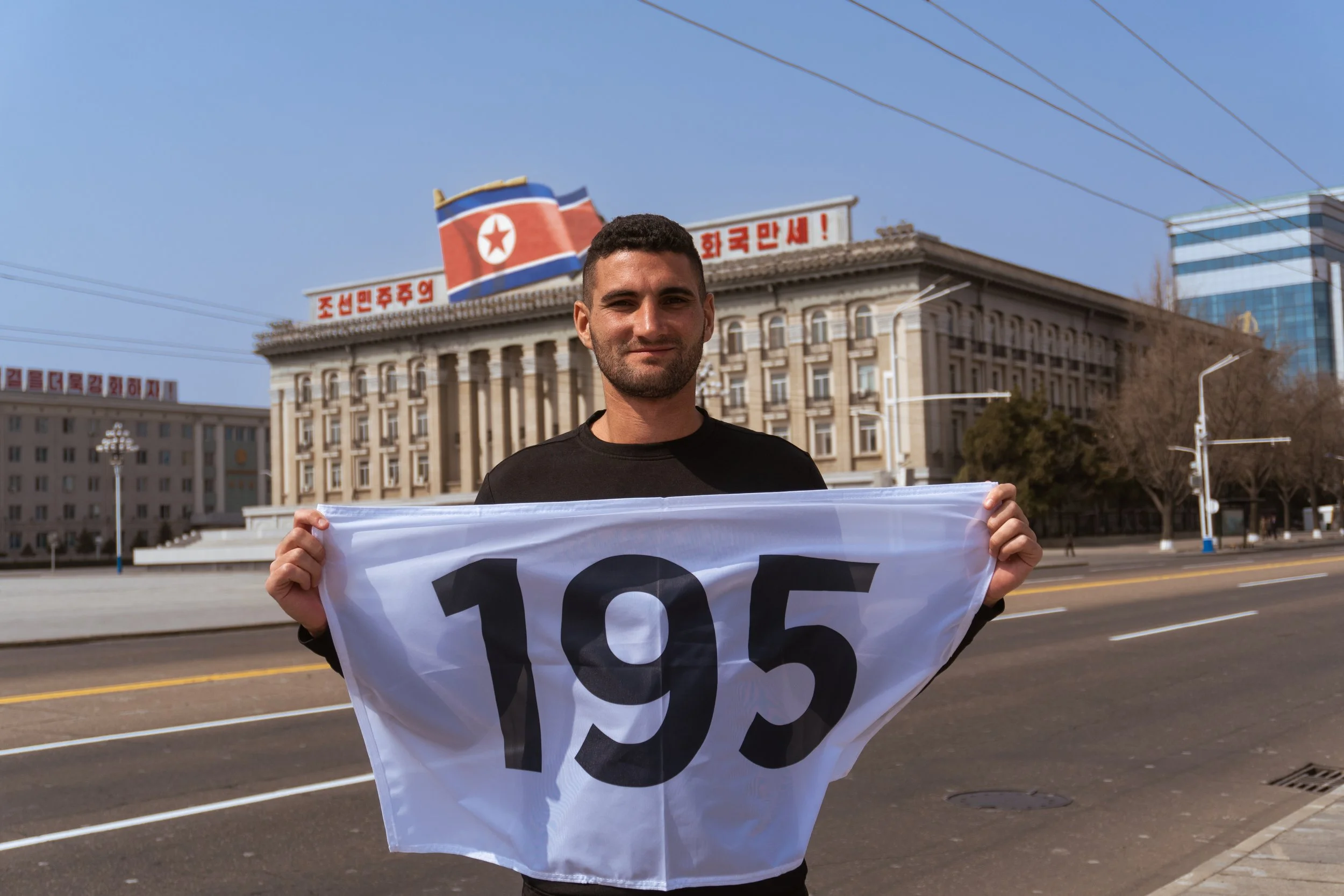 Cameron  Mofid completing his global travel across 195 countries