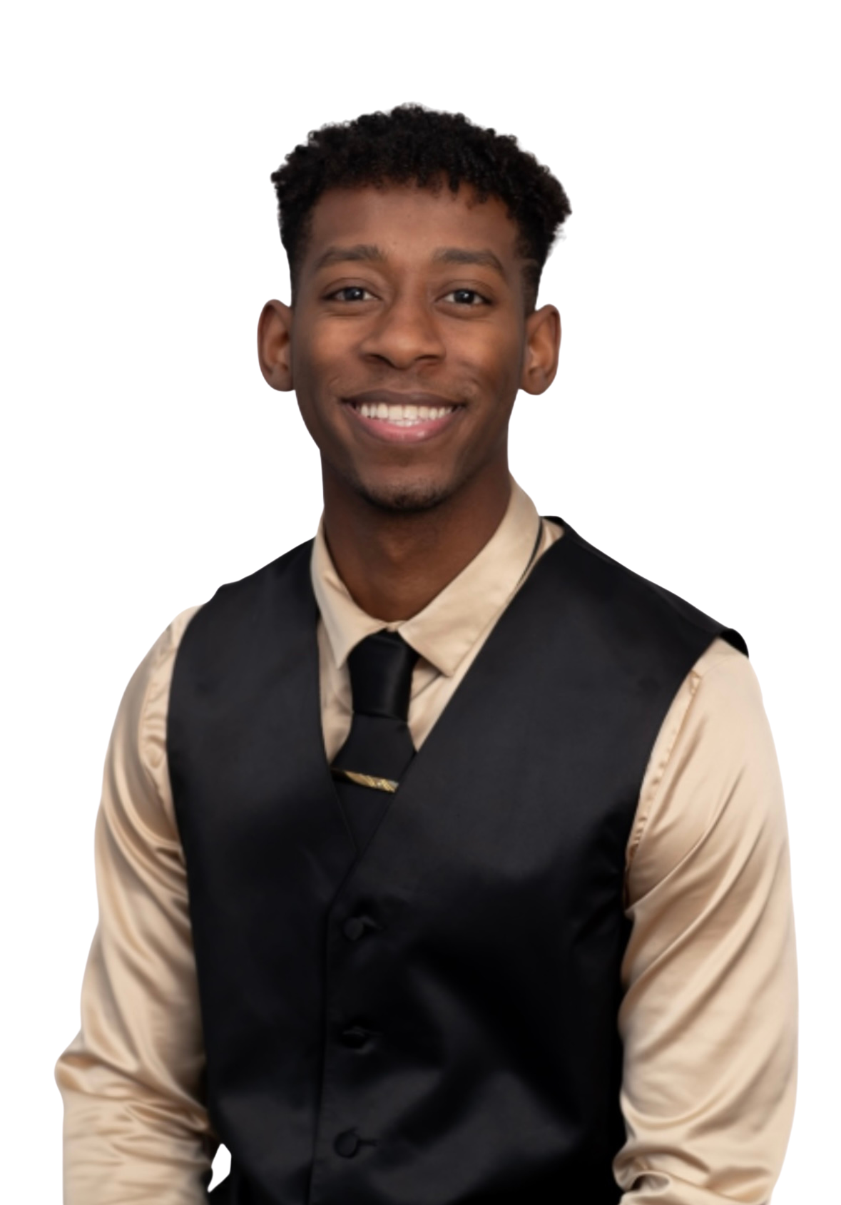 Young man with short curly hair wearing a beige shirt, black vest, and black tie, smiling against a plain white background.