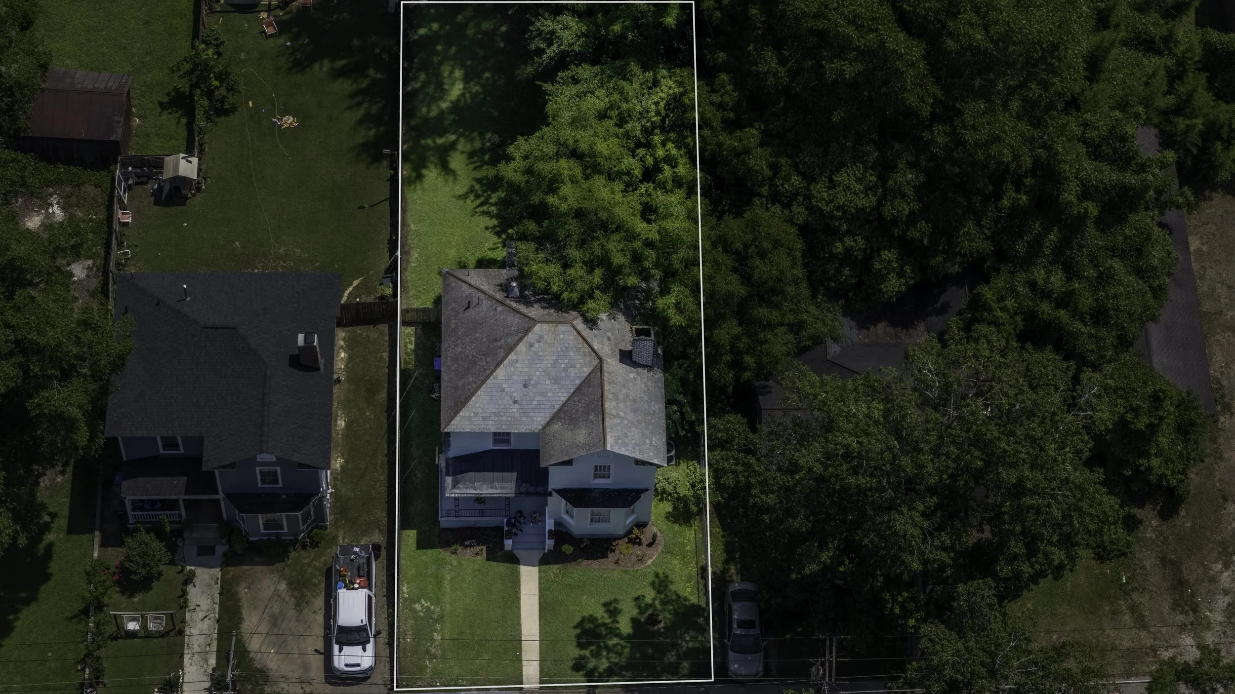Drone photography highlighting property boundaries, lot size, and surrounding area for a home in Fayetteville NC