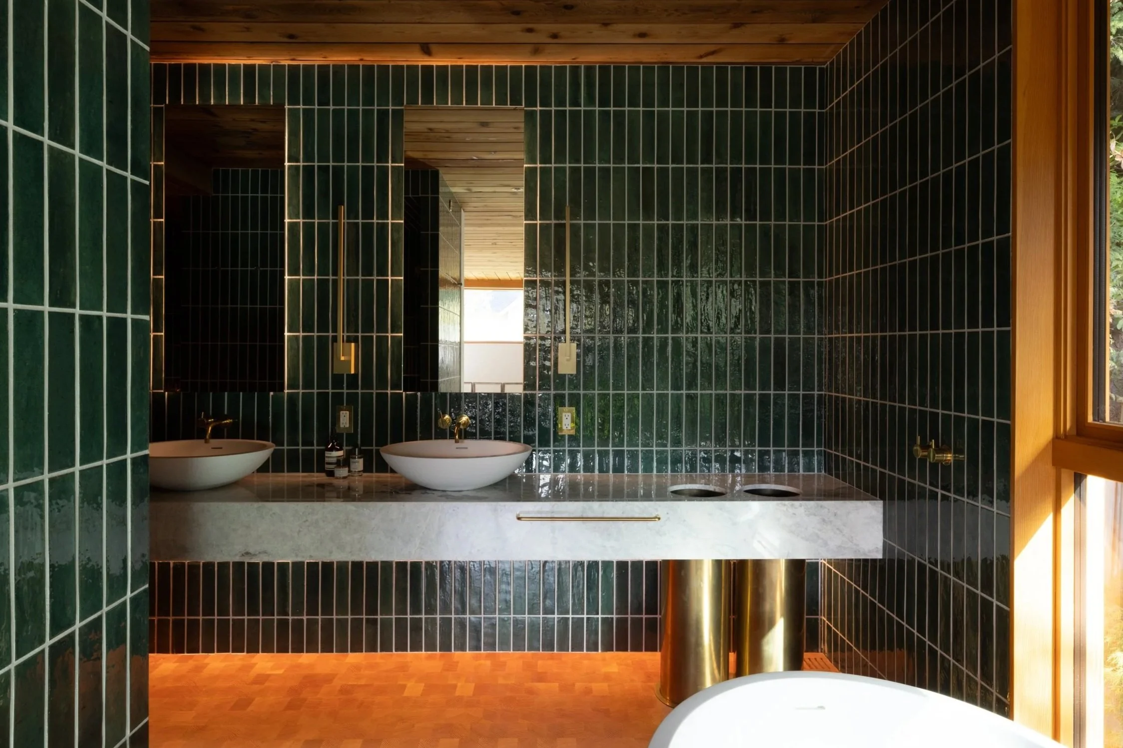 Luxury bathroom with emerald tile in a custom home in Vancouver, BC