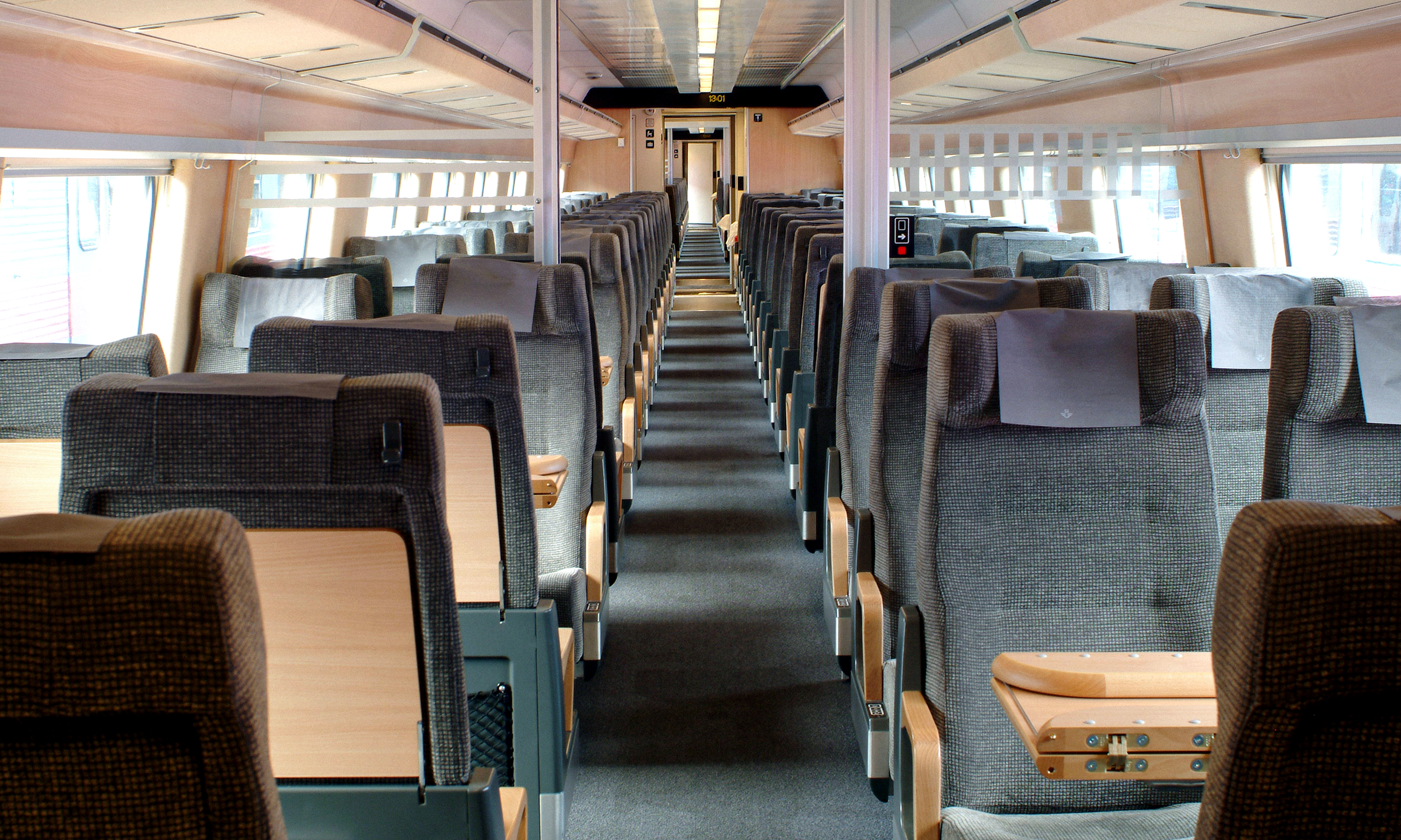 Redesigned interiors with wood veneer, new seat fabrics and matching neck rests