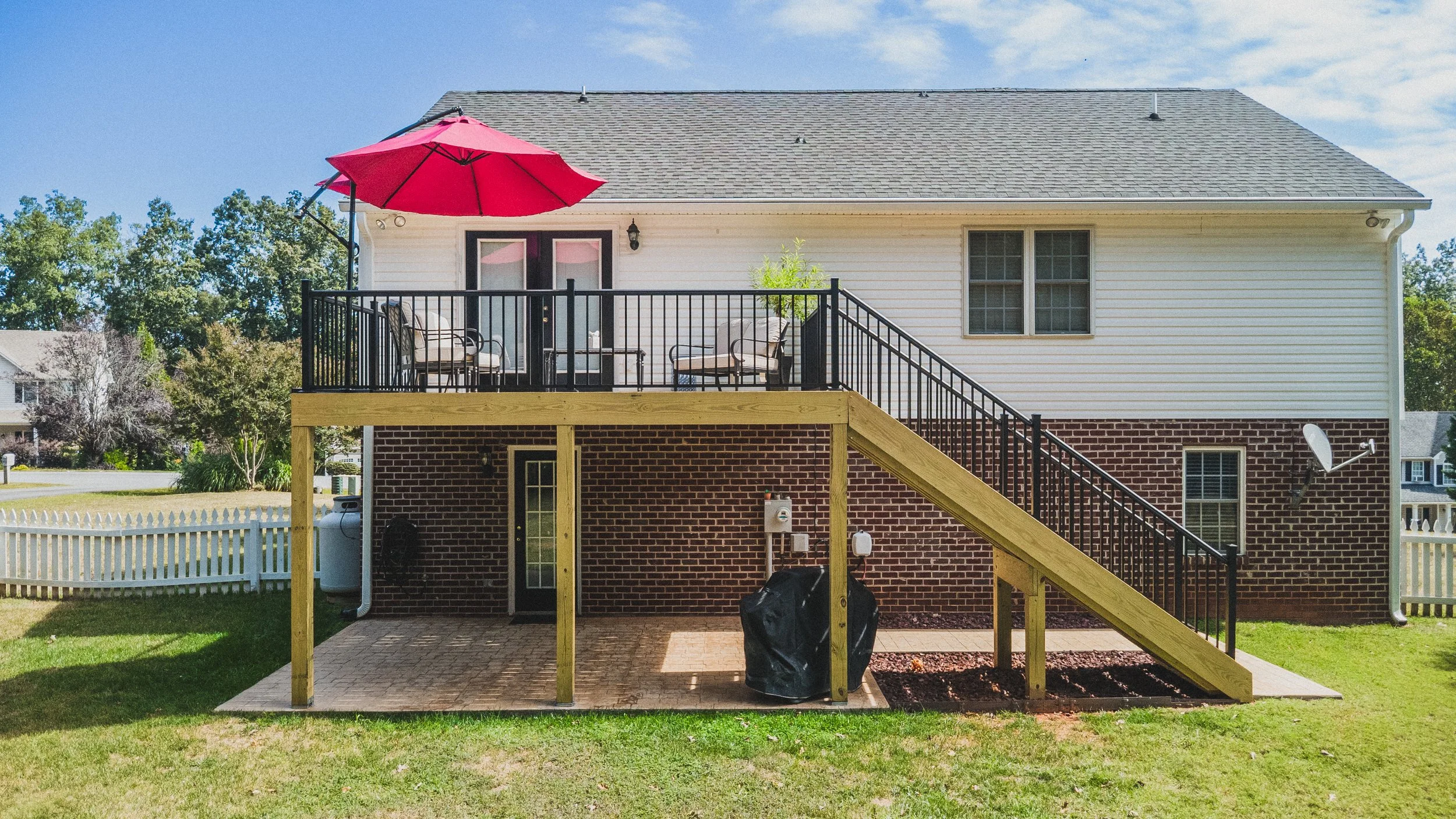rear view of house with deck