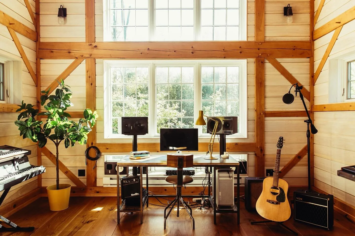 Denim insulation (made out of recycled 👖) hides behind these whitewashed wood planks and is kept from falling between the cracks by a layer of burlap. The result is an acoustically absorptive wall assembly for this recording studio that&rsquo;s fres
