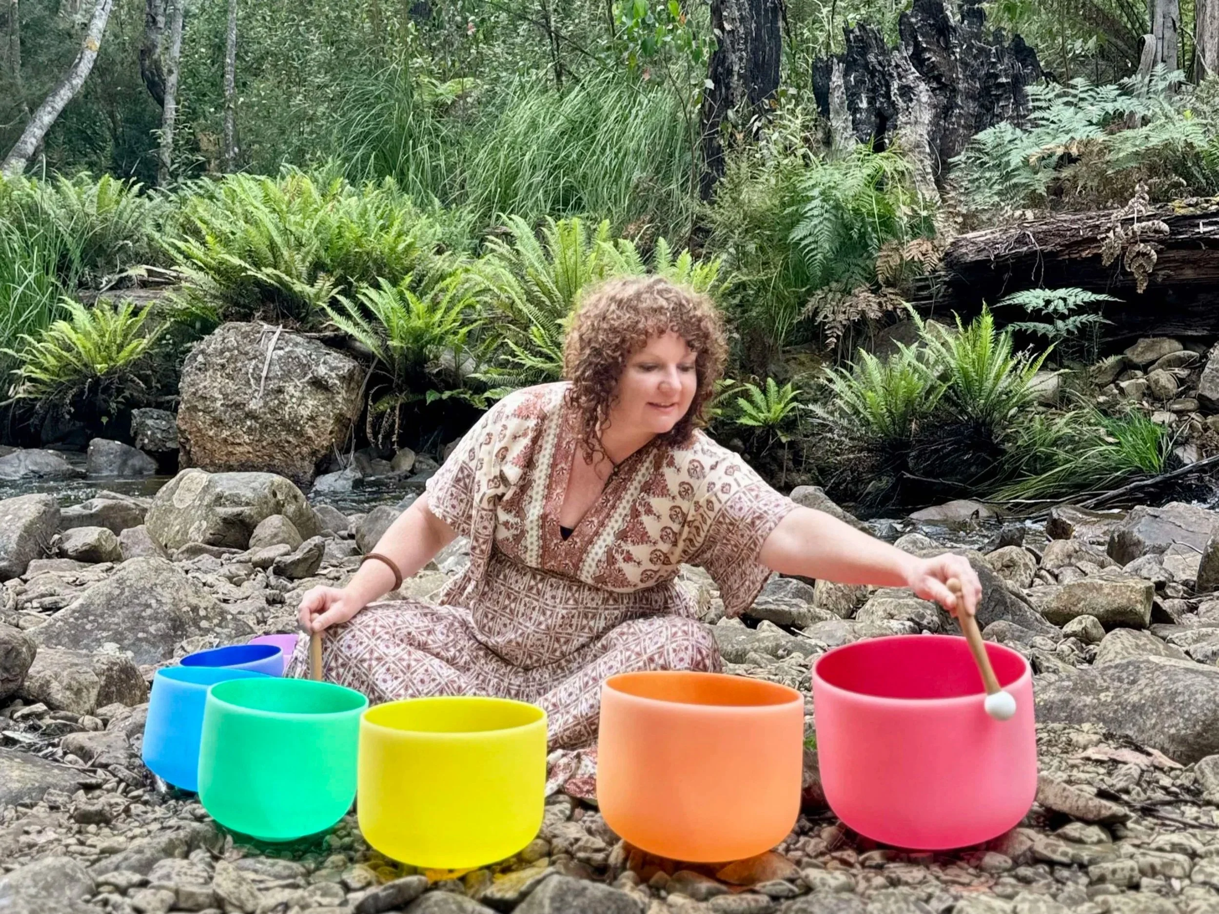 Sound healing session with crystal singing bowls in nature in the Huon Valley, Tasmania