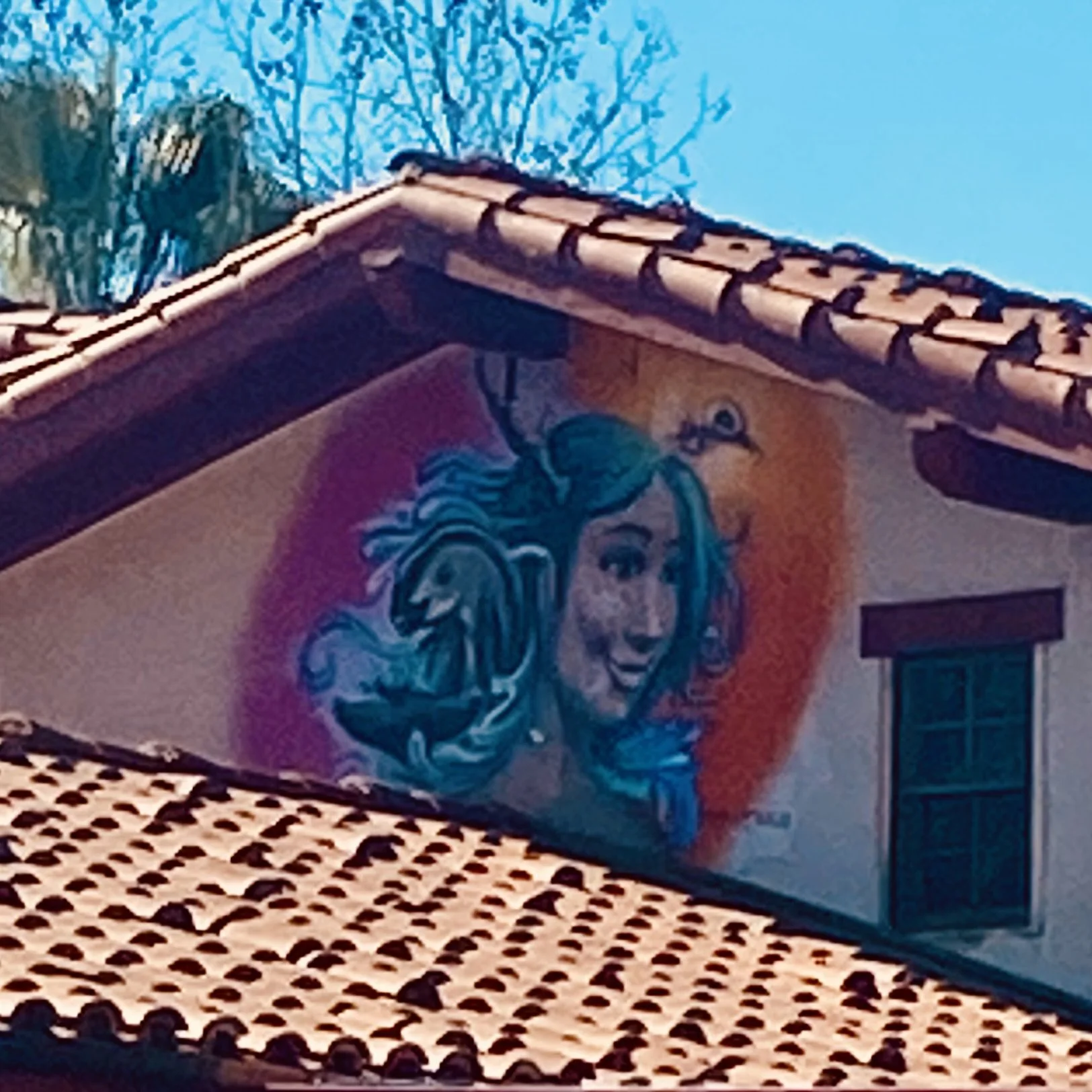 Colorful mural artwork on a historic Old Town San Diego building discovered through La Esquinas.