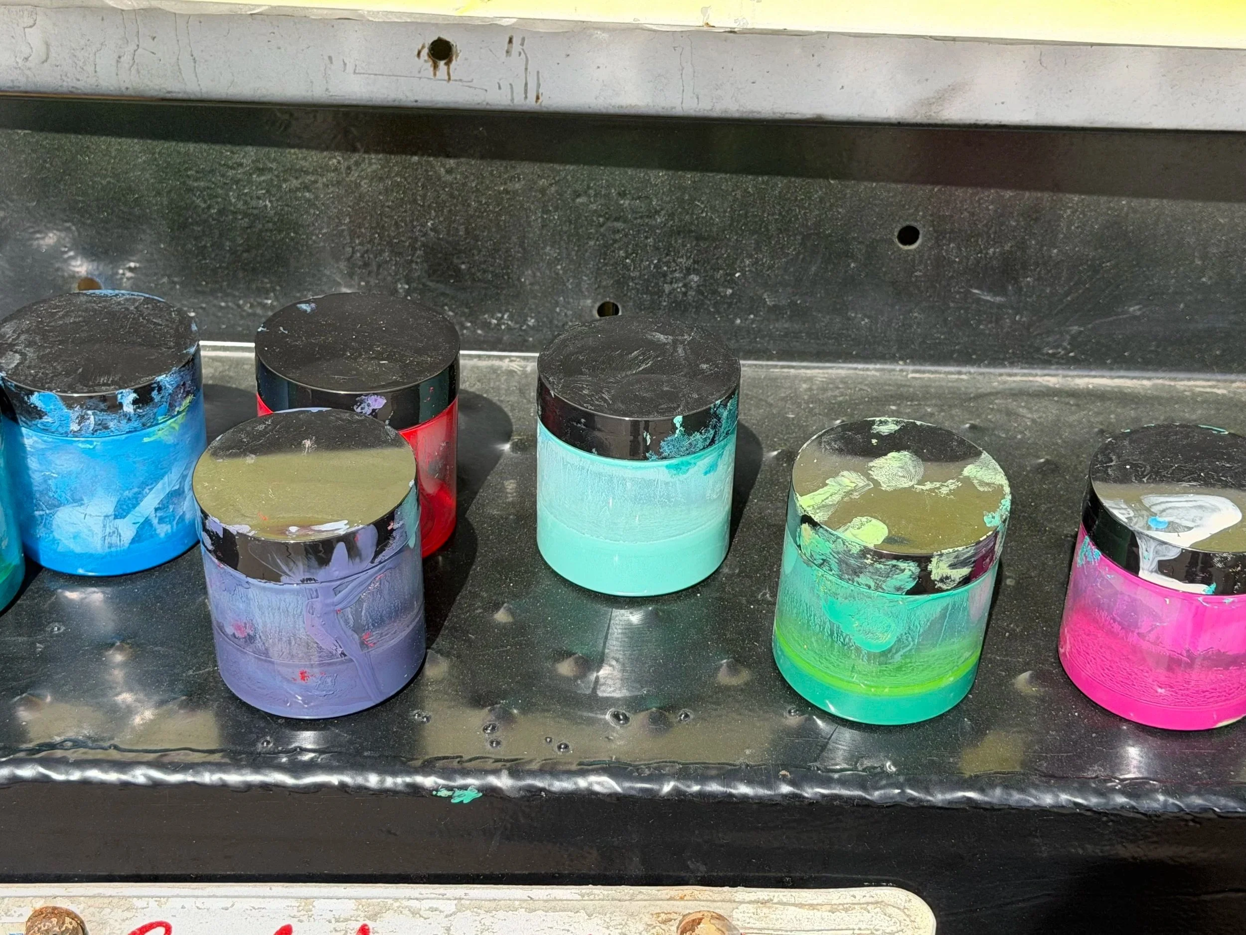 Paint colors used by artist Memuco during the hand-painted transformation of the La Esquinas mural truck.