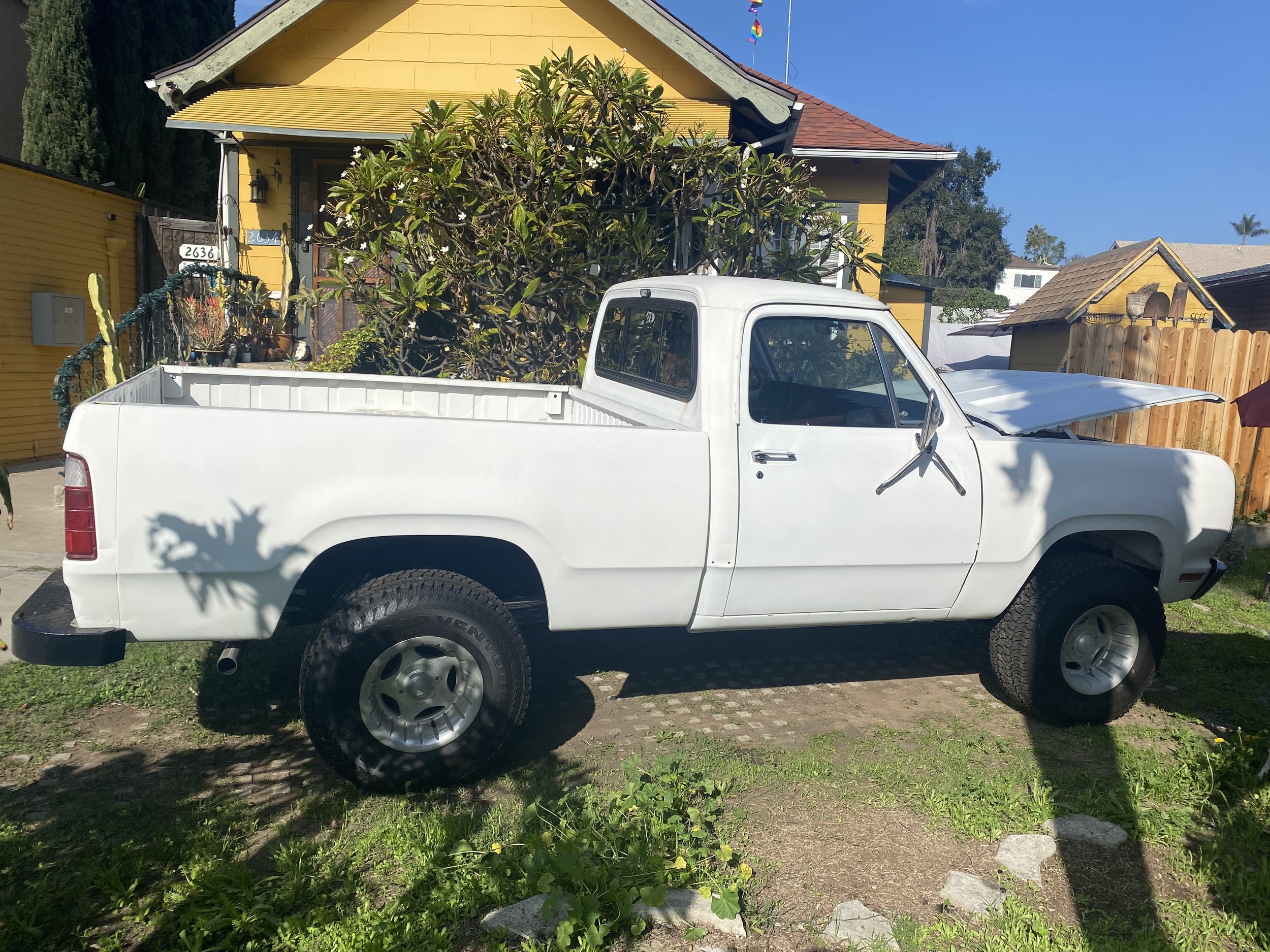 Rebuilt Dodge W100 photographed after restoration with fresh paint and reassembled body panels.