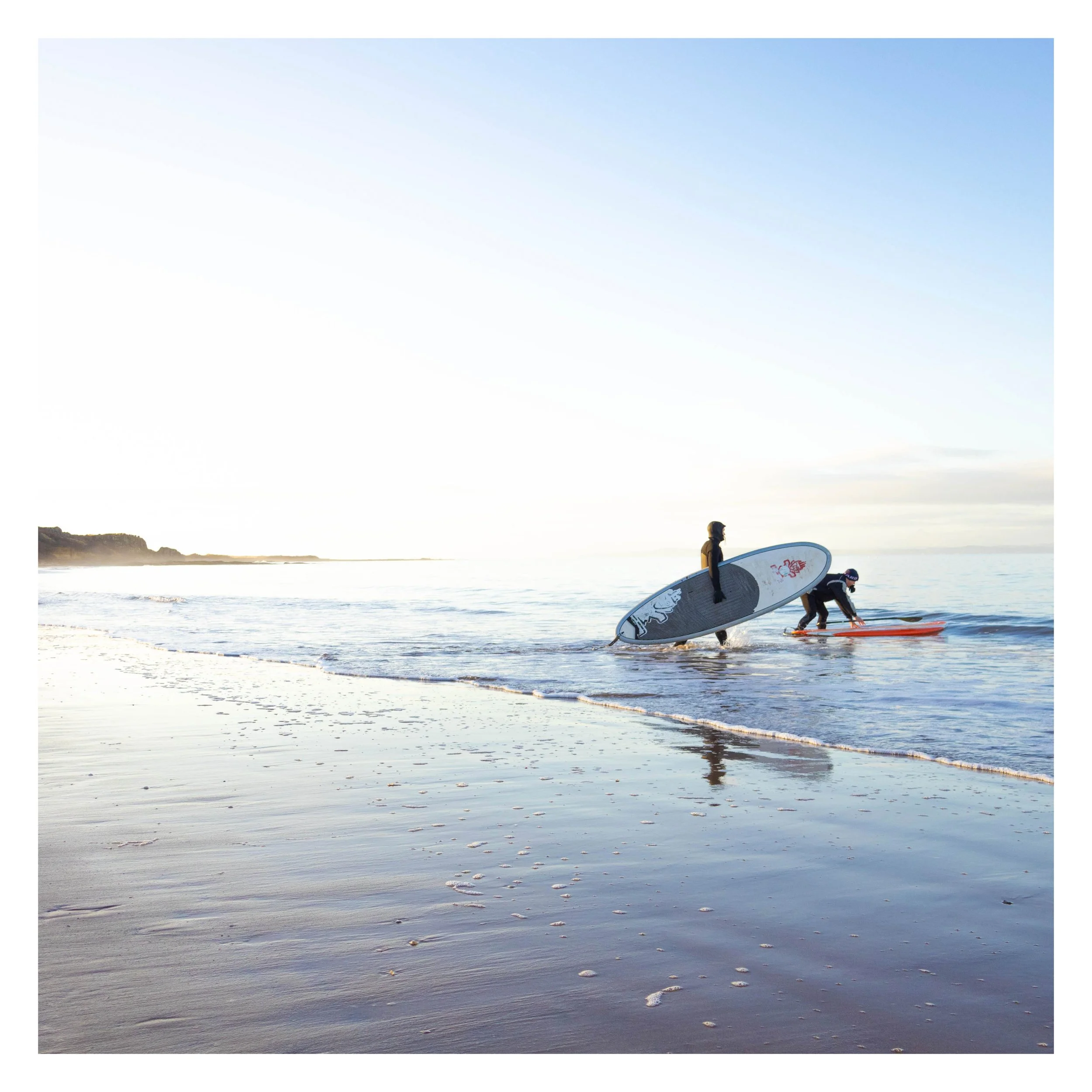 Surfers at Gullane Beach