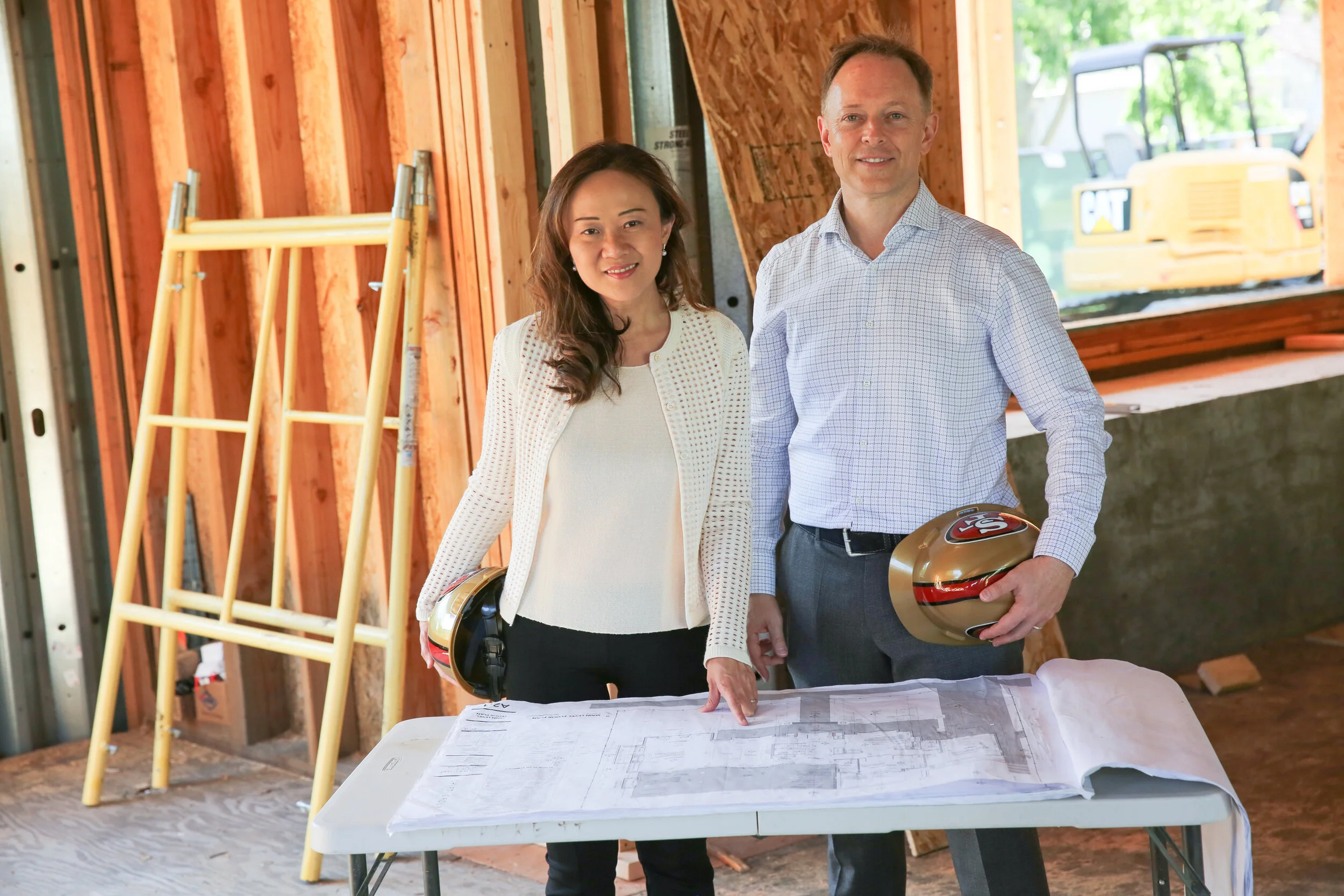 This is a picture of Gloria and John Young at the construction site in Atherton