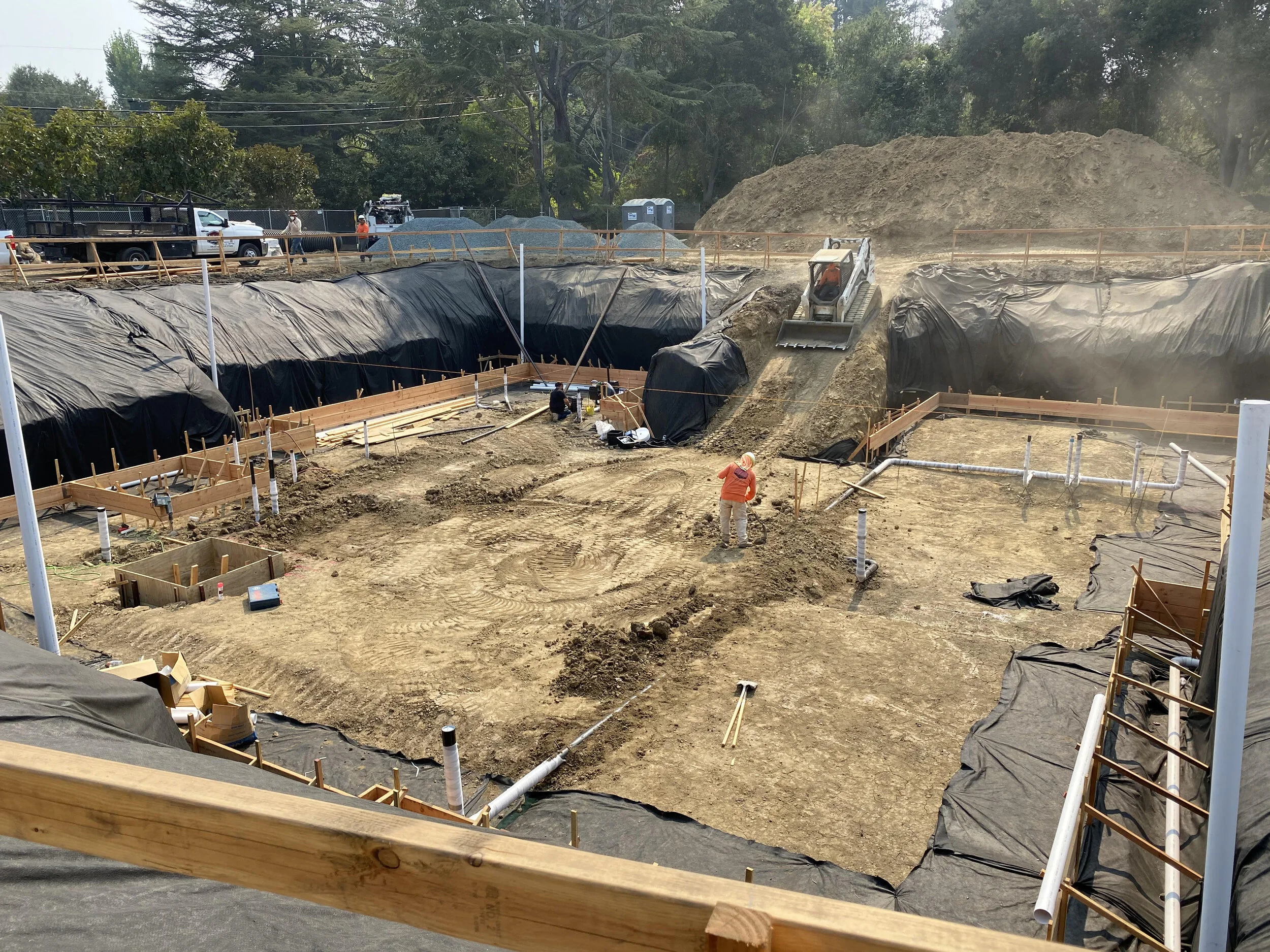 The deepest parts of the plumbing go in first