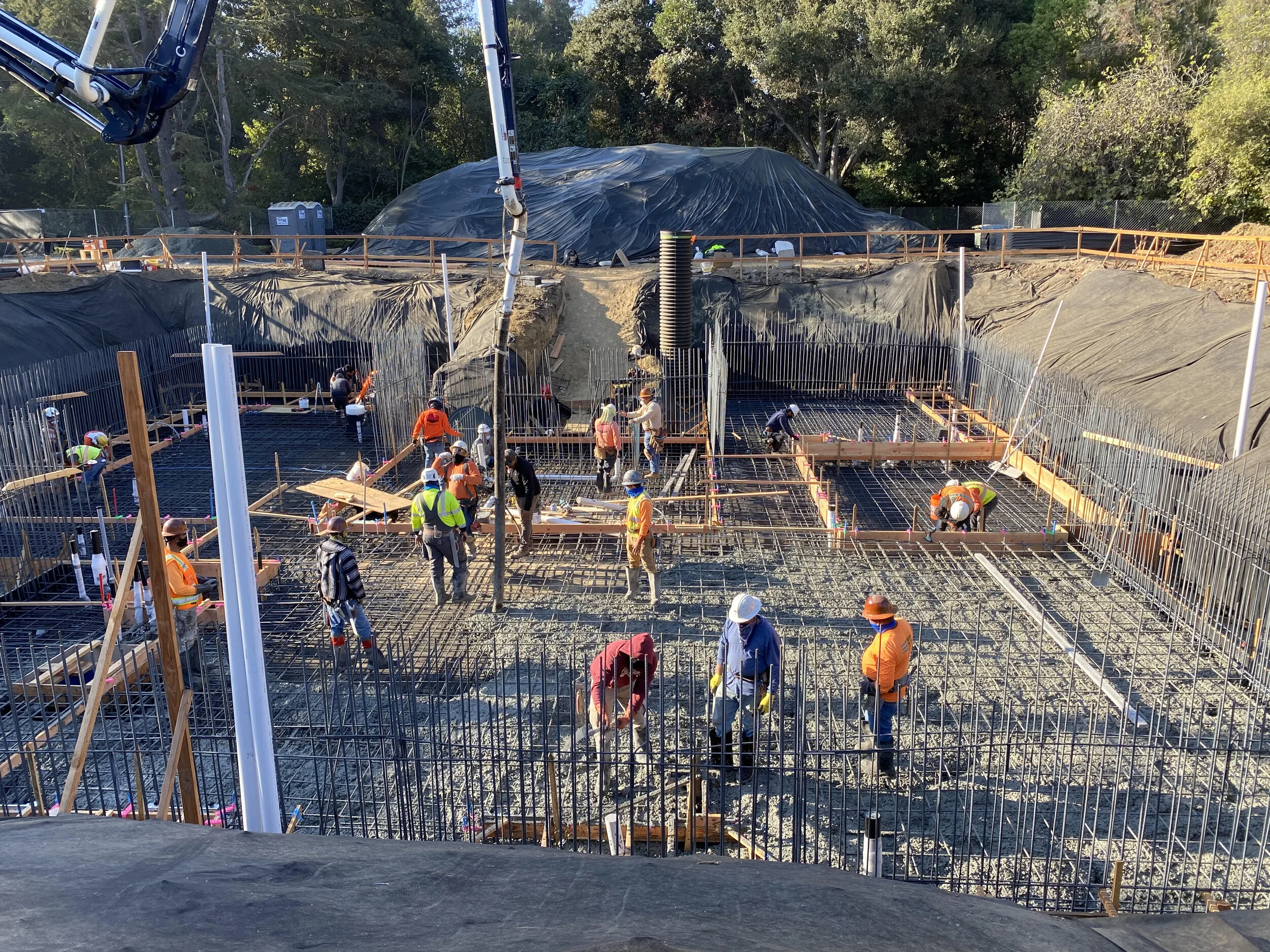 Pouring the mat slab means lots of hot concete going in fast