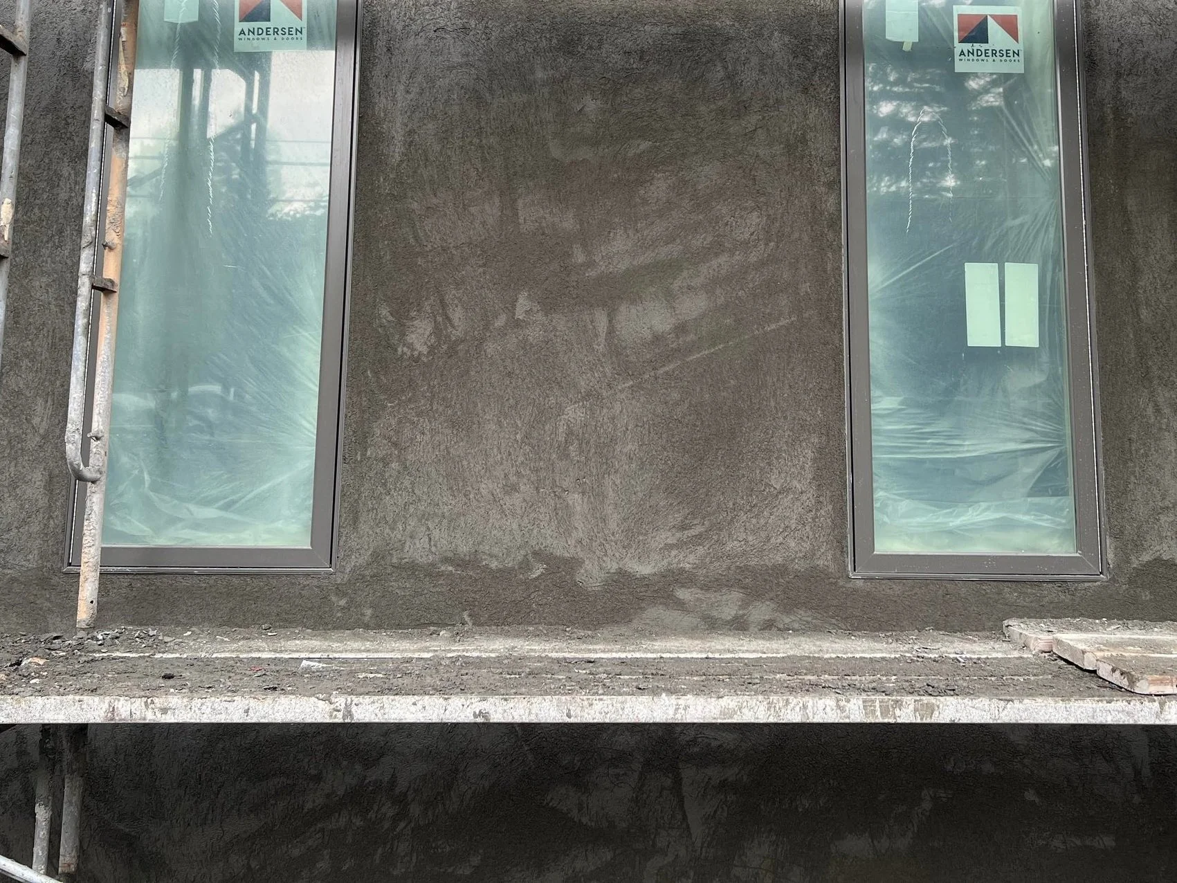 This is stage two of the stucco process, called the "brown coat"