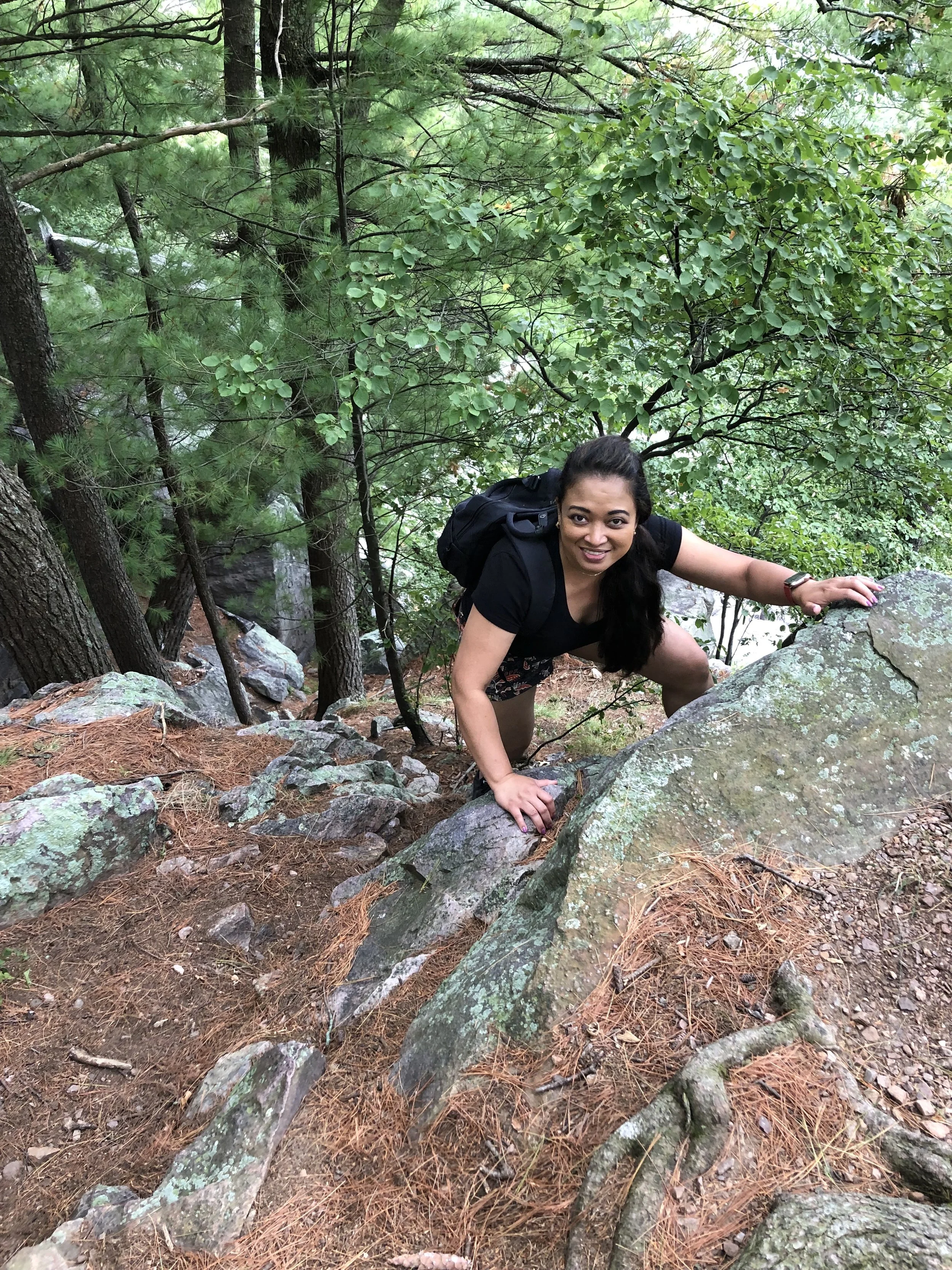 Founder of CypressHolistic Psychiatry hiking in nature, emphasizing the connection between mental health and overall well-being