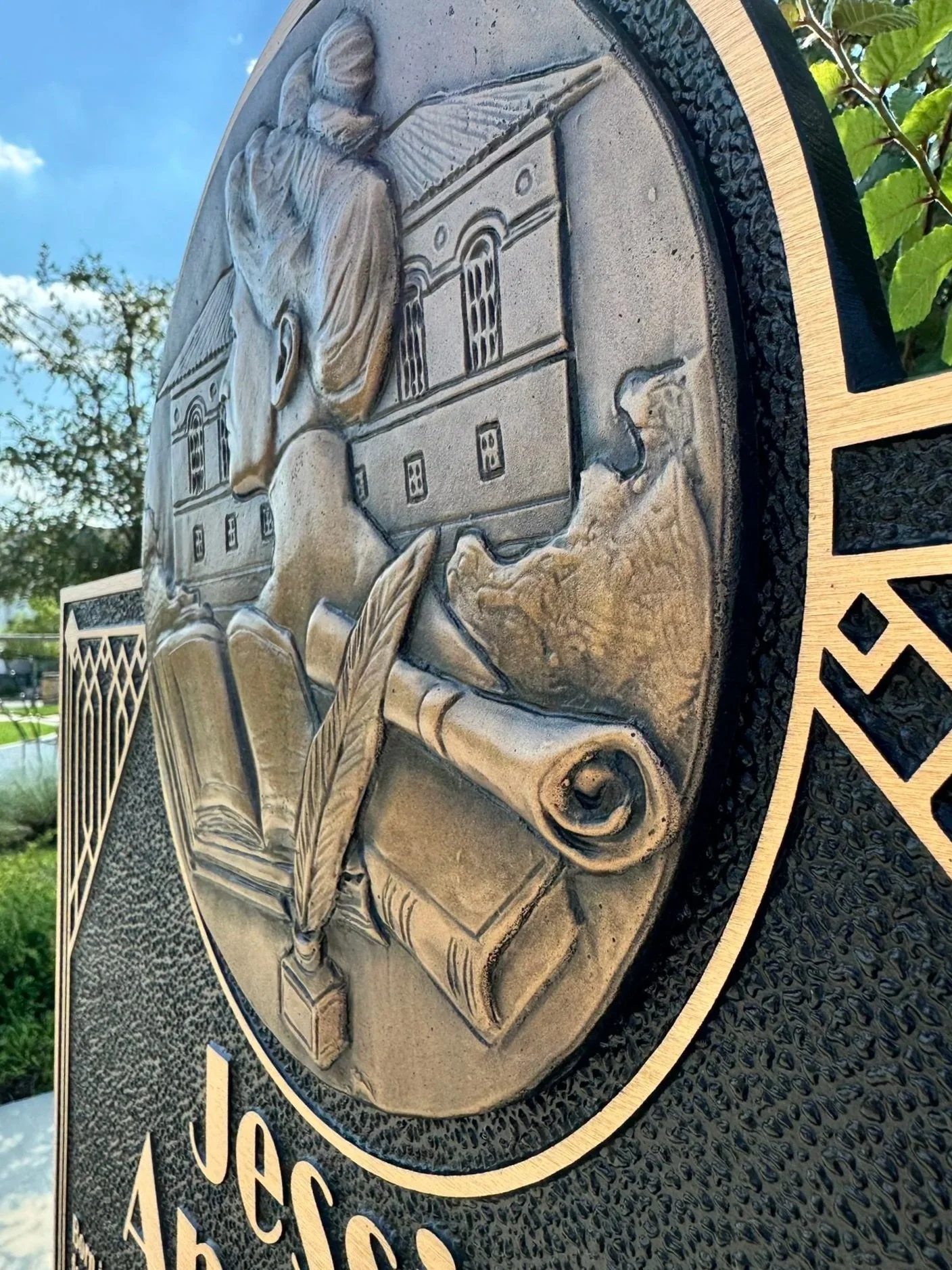 bronze bas relief sign for Jessie Andrews