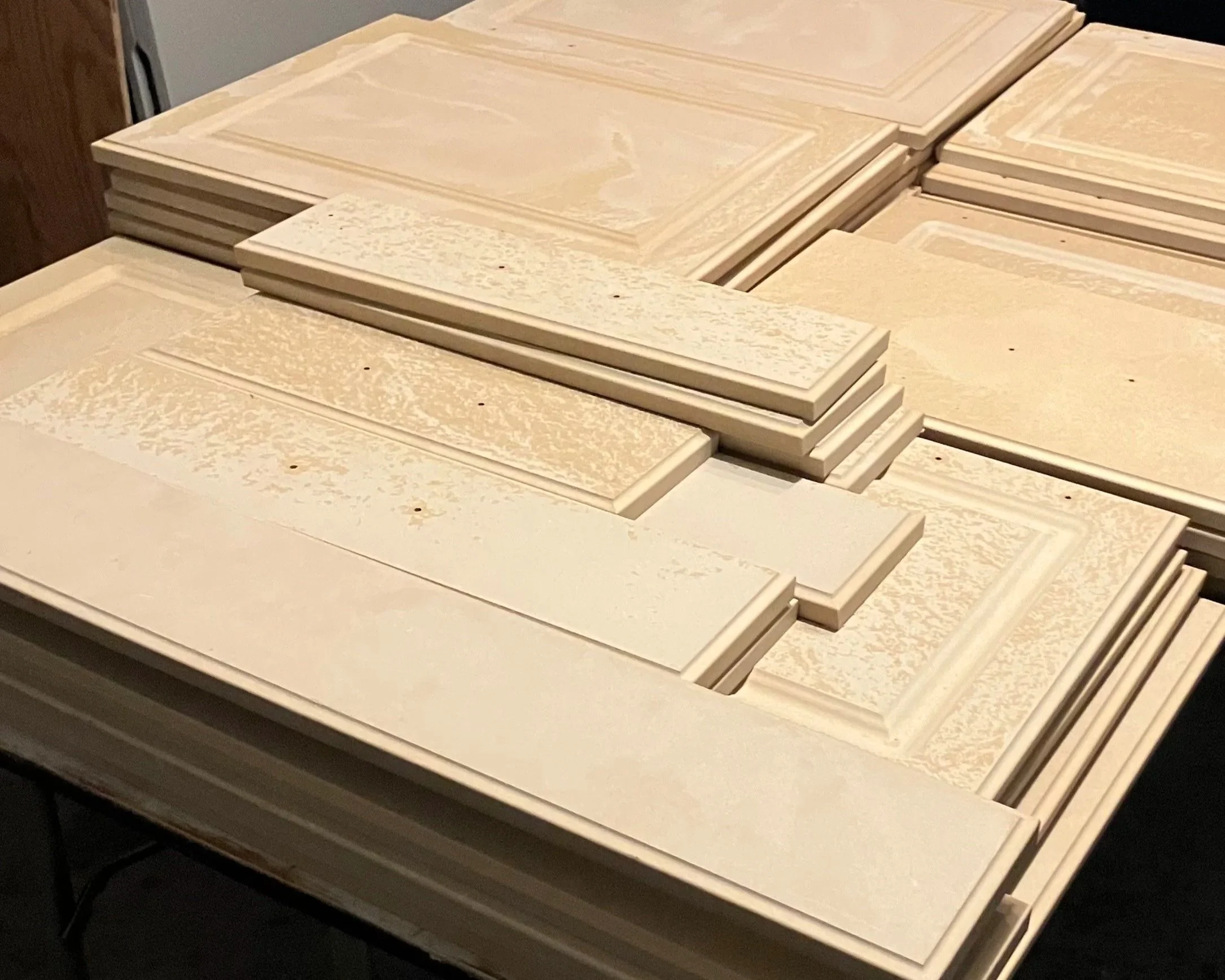 Cabinet doors stacked during surface preparation