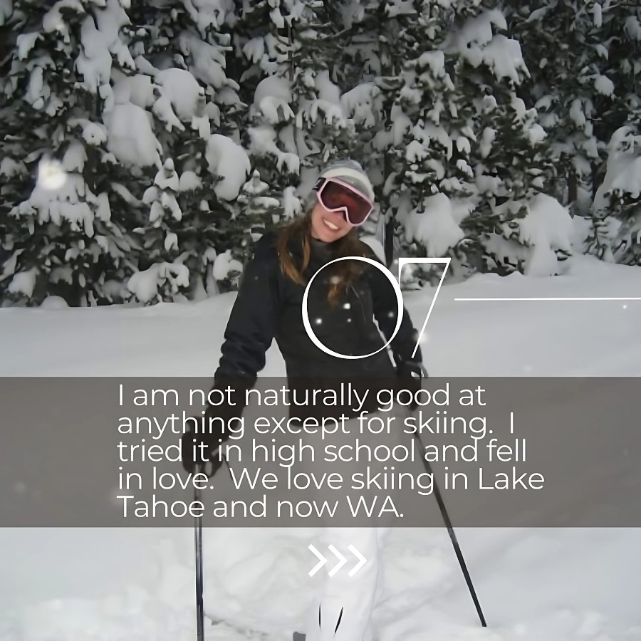A woman snow skiing in a snowy, forested area, wearing skiing gear including goggles and a helmet.