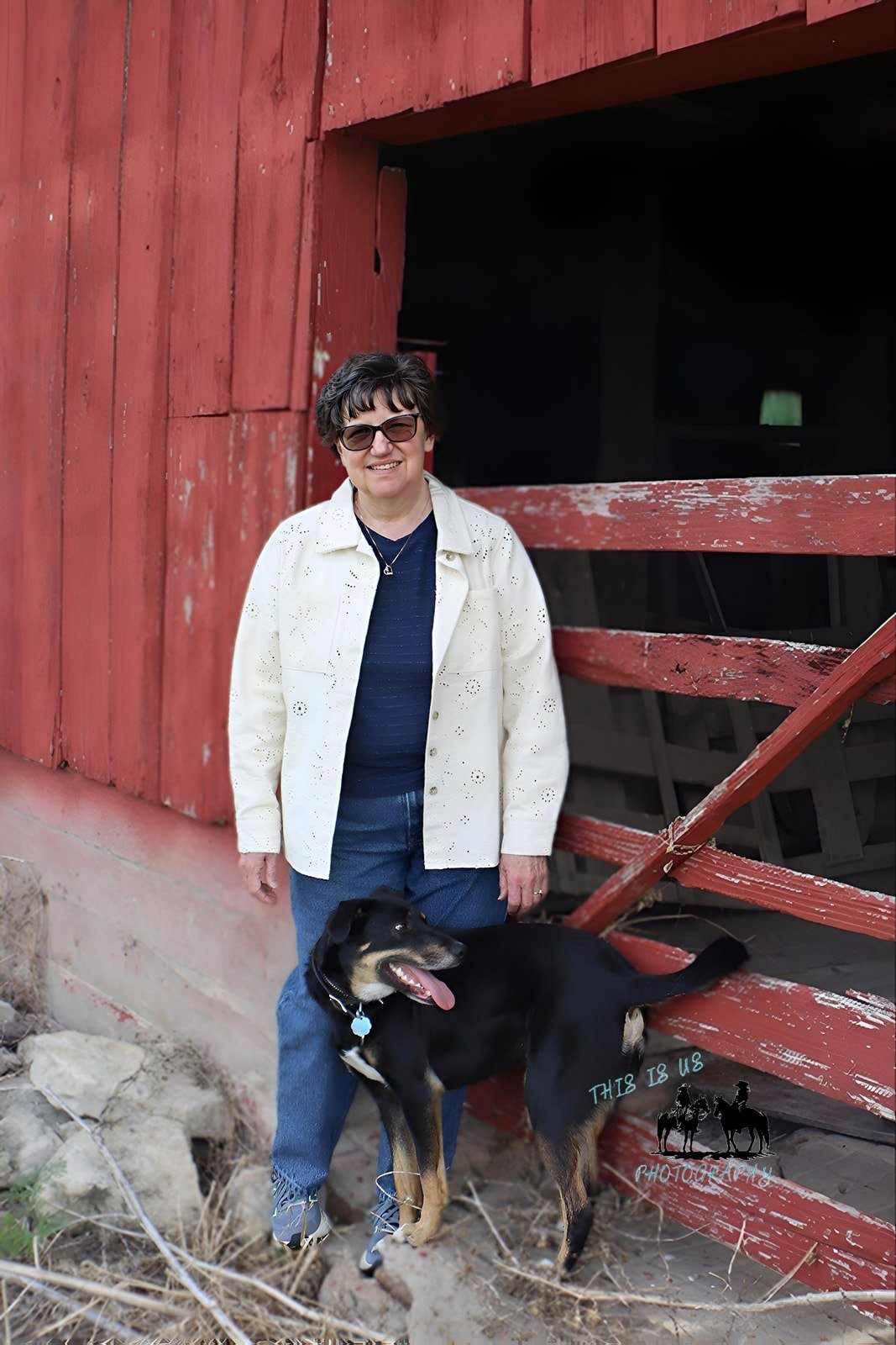 Renata McCulloch, bookkeeper and small business owner, on her homestead with her dog near Wichita, Kansas