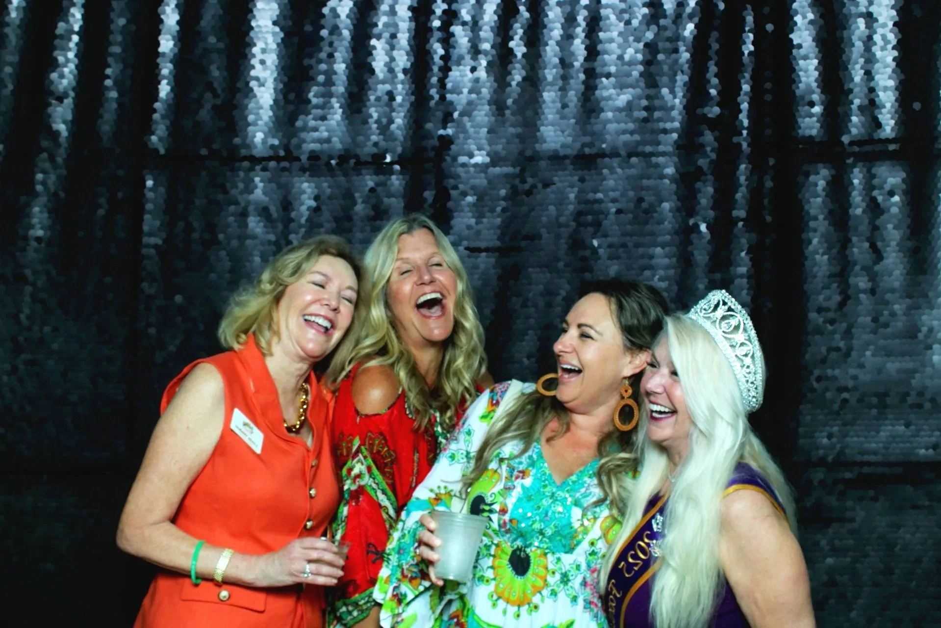 Guests take a fun photo at the photo booth rental in Key West Florida provided by Conch Cam Photo Booth Rentals