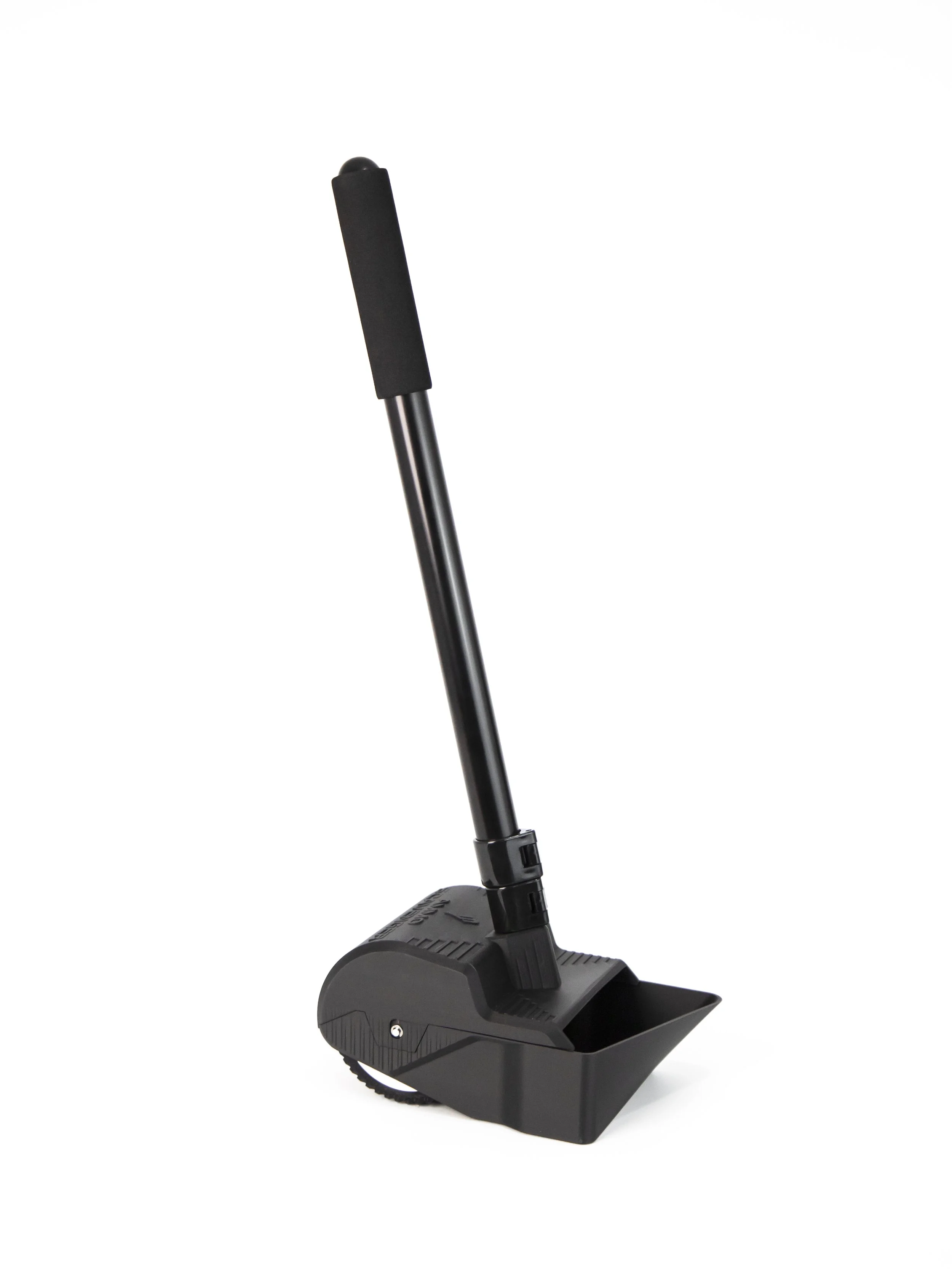 The grass scavenger, a tool used to pick up spent brass cases off grass against a white background.