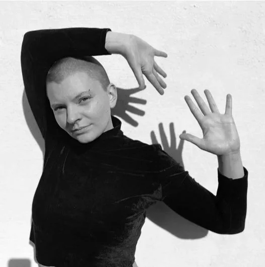  Kat Brault 

 Kat is an ever-emerging queer & trans dance artist hell-bent on healing the hearts of this and other worlds. A graduate of UC Santa Cruz in 2019 with a major in Feminist Studies, they are a beloved dance educator, creator, and performe