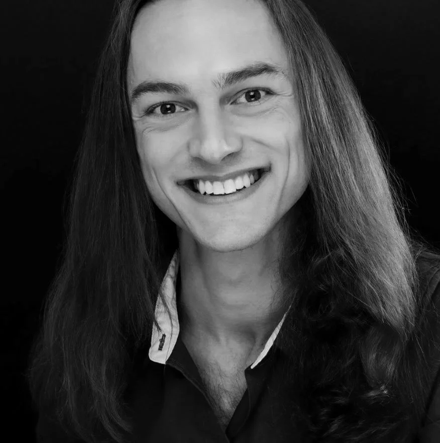  Trask Reinhart 

 Trask began his movement background in Northern Michigan with hockey, baseball, and martial arts. He began ballet at the age of 18 and has since obtained a BA in Dance from Western Michigan University with a tri-focus in ballet, ja