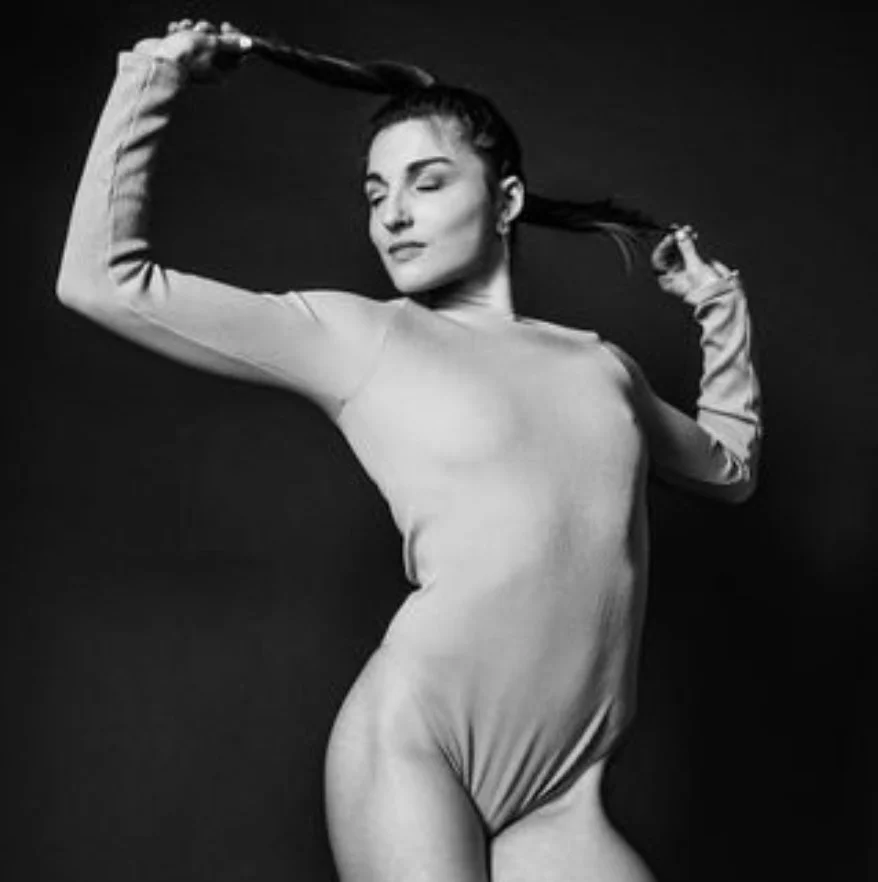  Anna Gichan 

 Anna holds a BFA in Dance from Rutgers’ Mason Gross School of the Arts, and has a background in gymnastics, yoga, and circus. Through her movement, she aims to experience and expand her physical edges, sensations and emotions.  Her ex