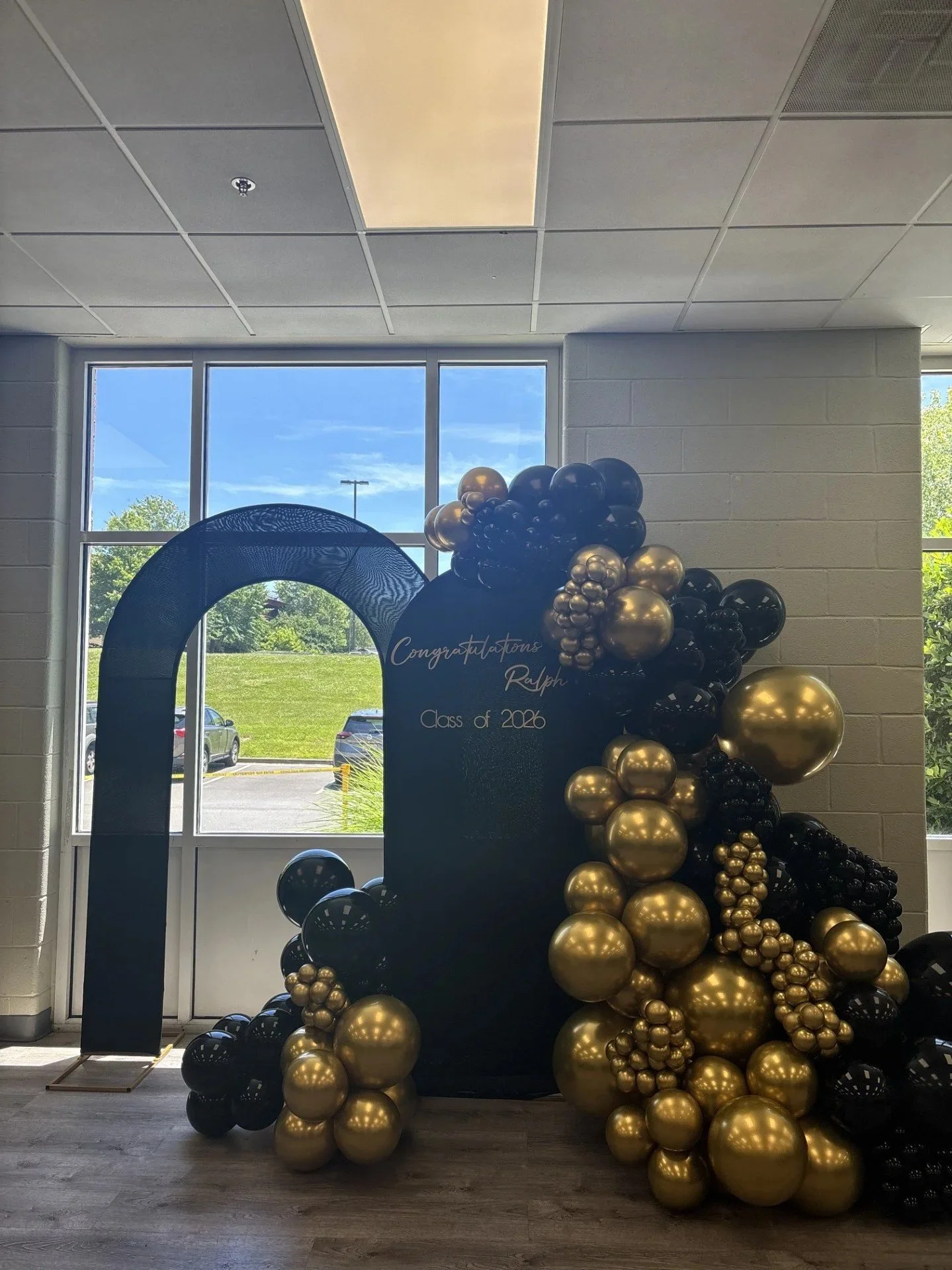 Organic Balloon Arch with custom signage.