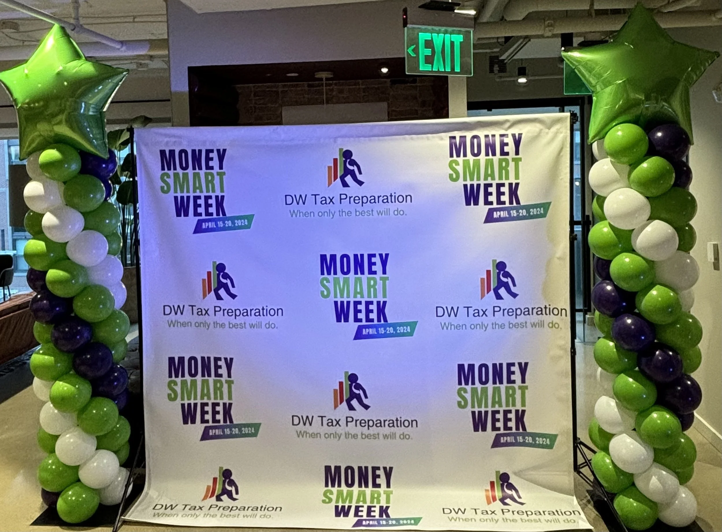 Event banner for Money Smart Week, April 15-20, 2024, with balloon columns. 