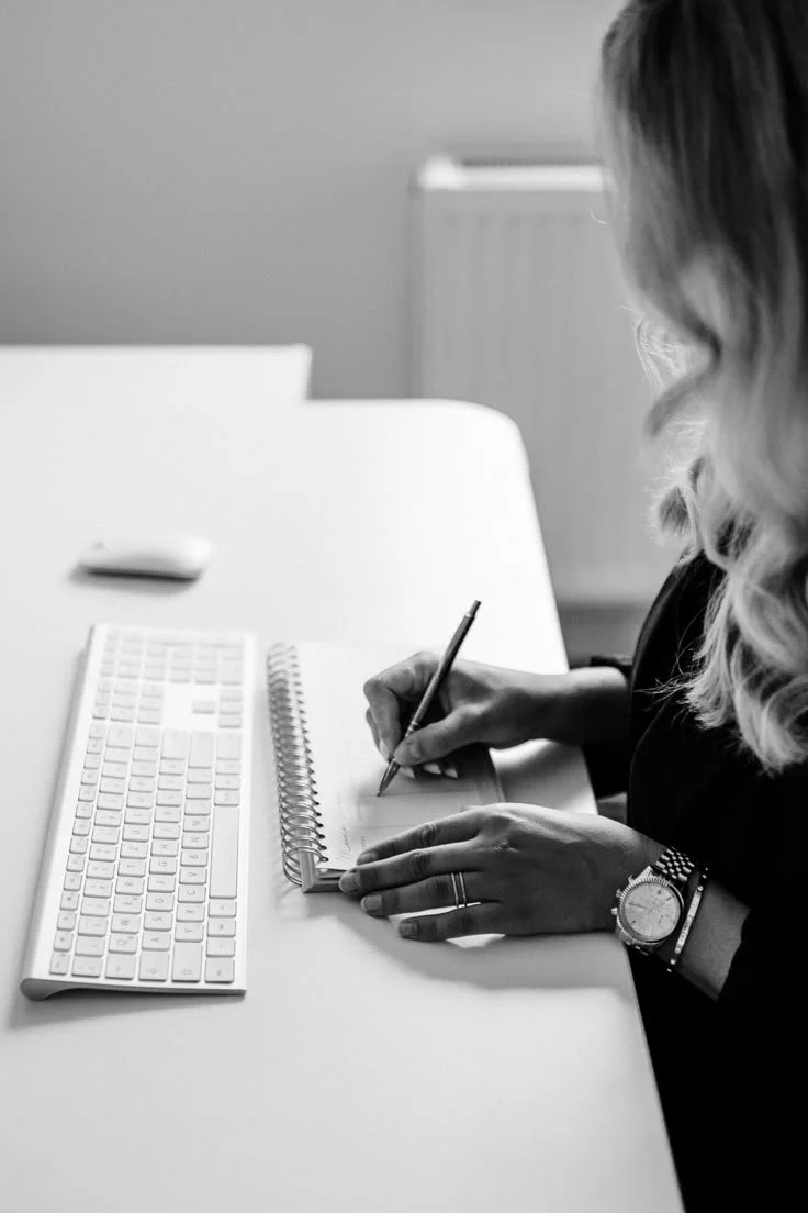 Professional Bid writer at a work desk