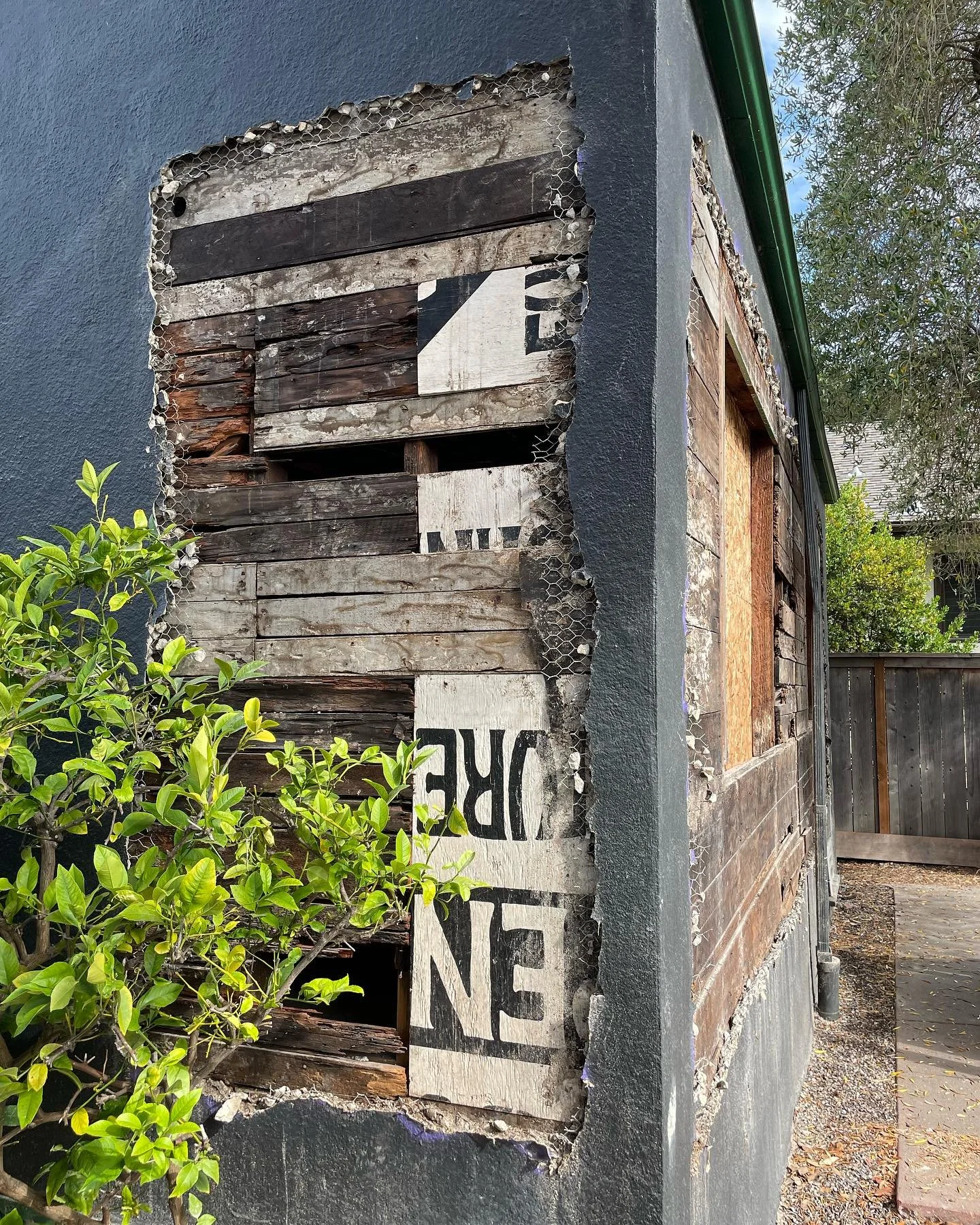 Found during demolition.  I guess they ran out of sheathing!