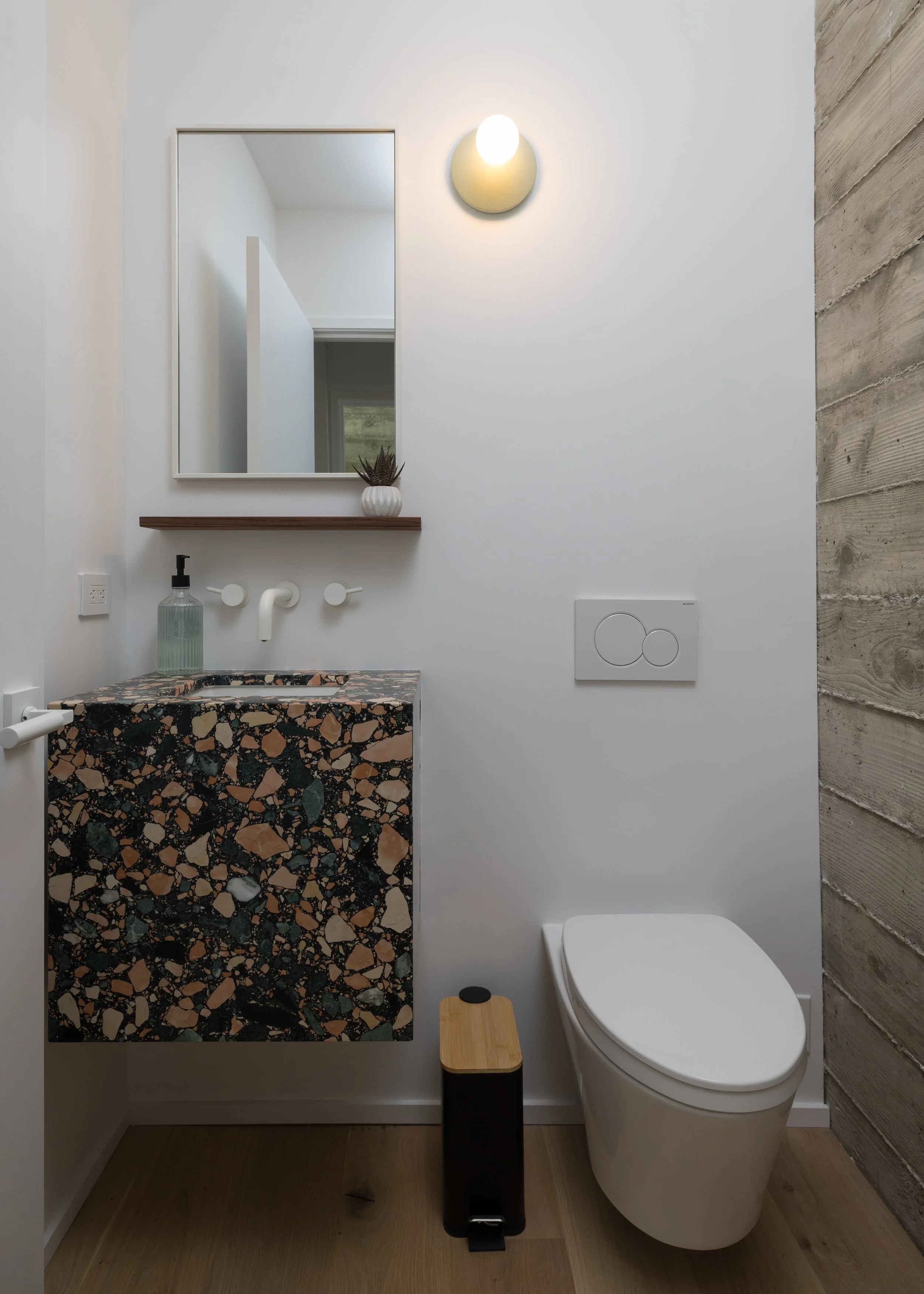 Half Bath with custom floating walnut vanity - New Construction - Fold House - Berkeley Hills CA - CB Architecture + Design
