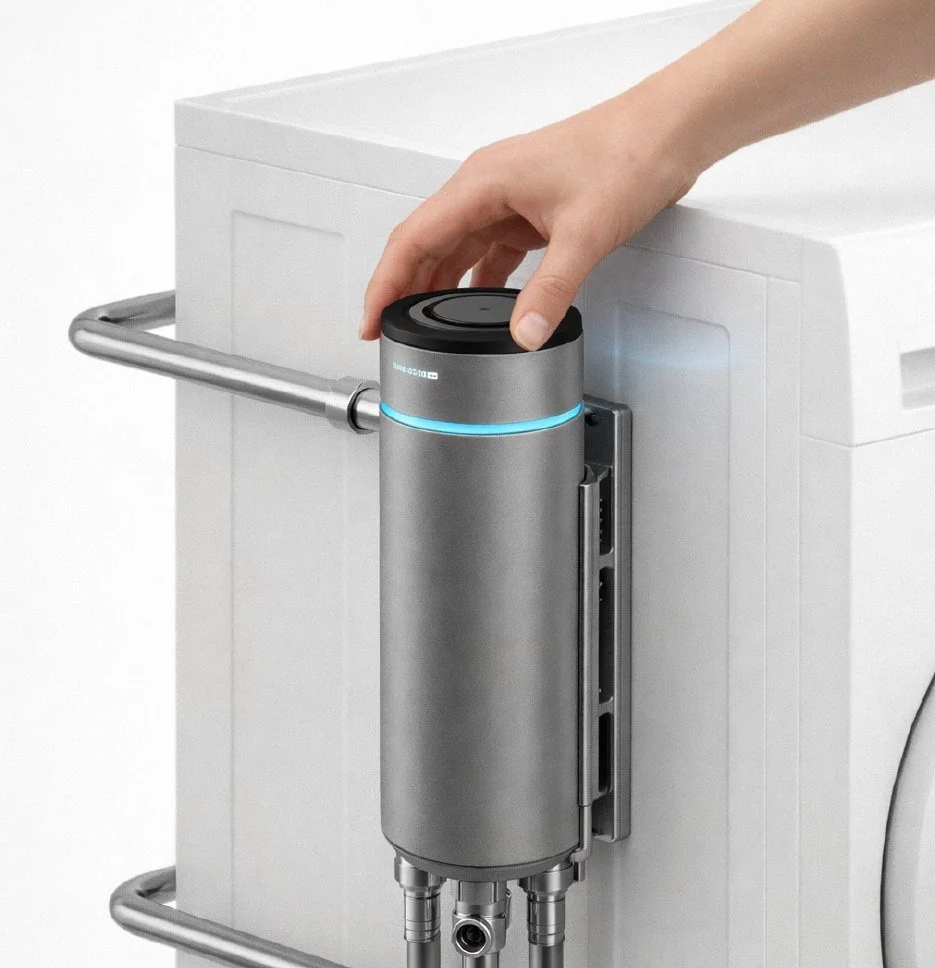 A hand twisting a cartridge into Hydrocore mounted on the side of a washing machine