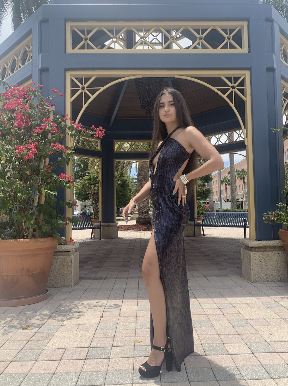Z DRESS — A black crisscross bling-embellished dress inspired by Malcolm & Marie, featuring a dramatic open back and high slit. 