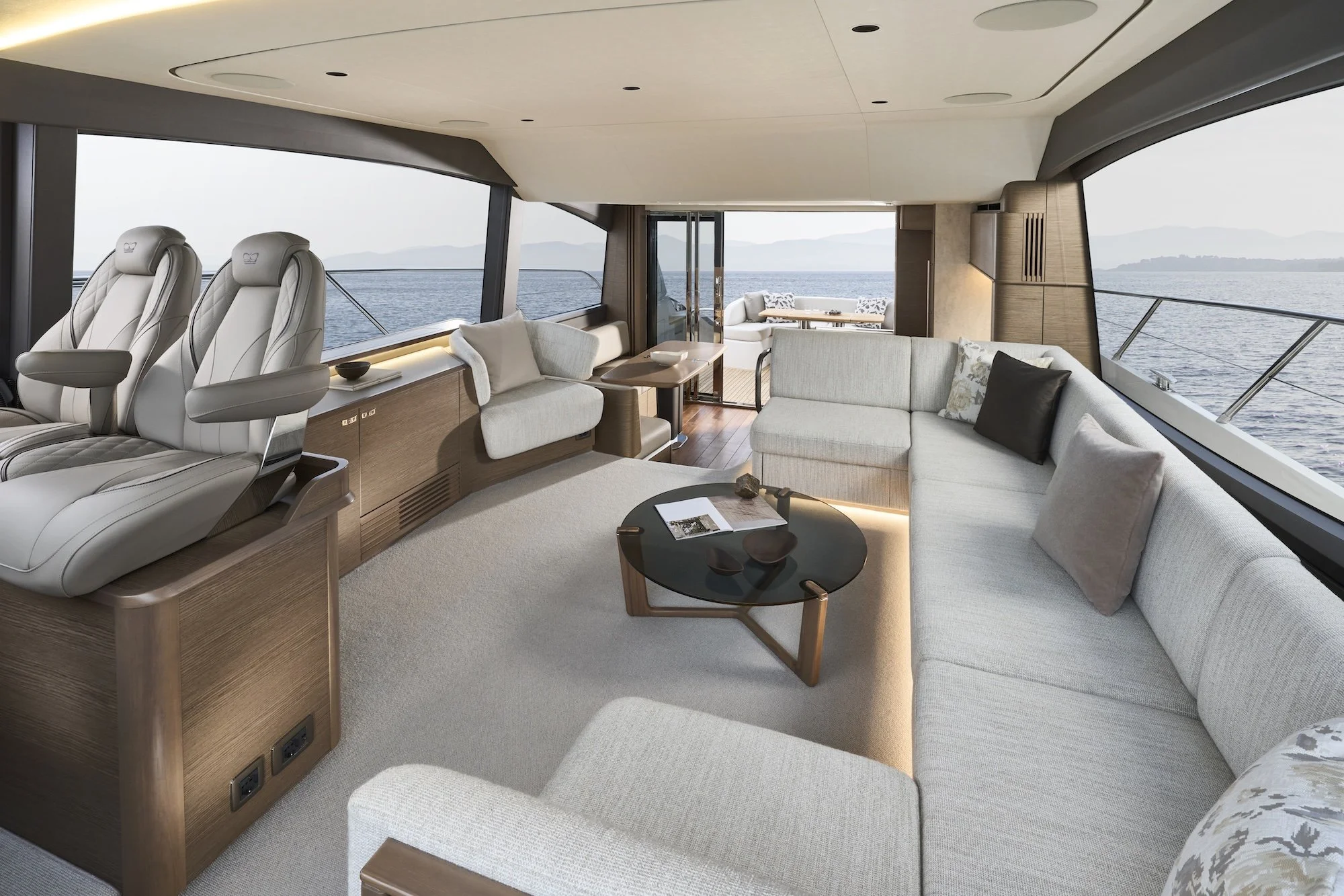 Princess_F58-interior-saloon-looking-aft-with-optional-chair-table-open-silver-oak.jpg