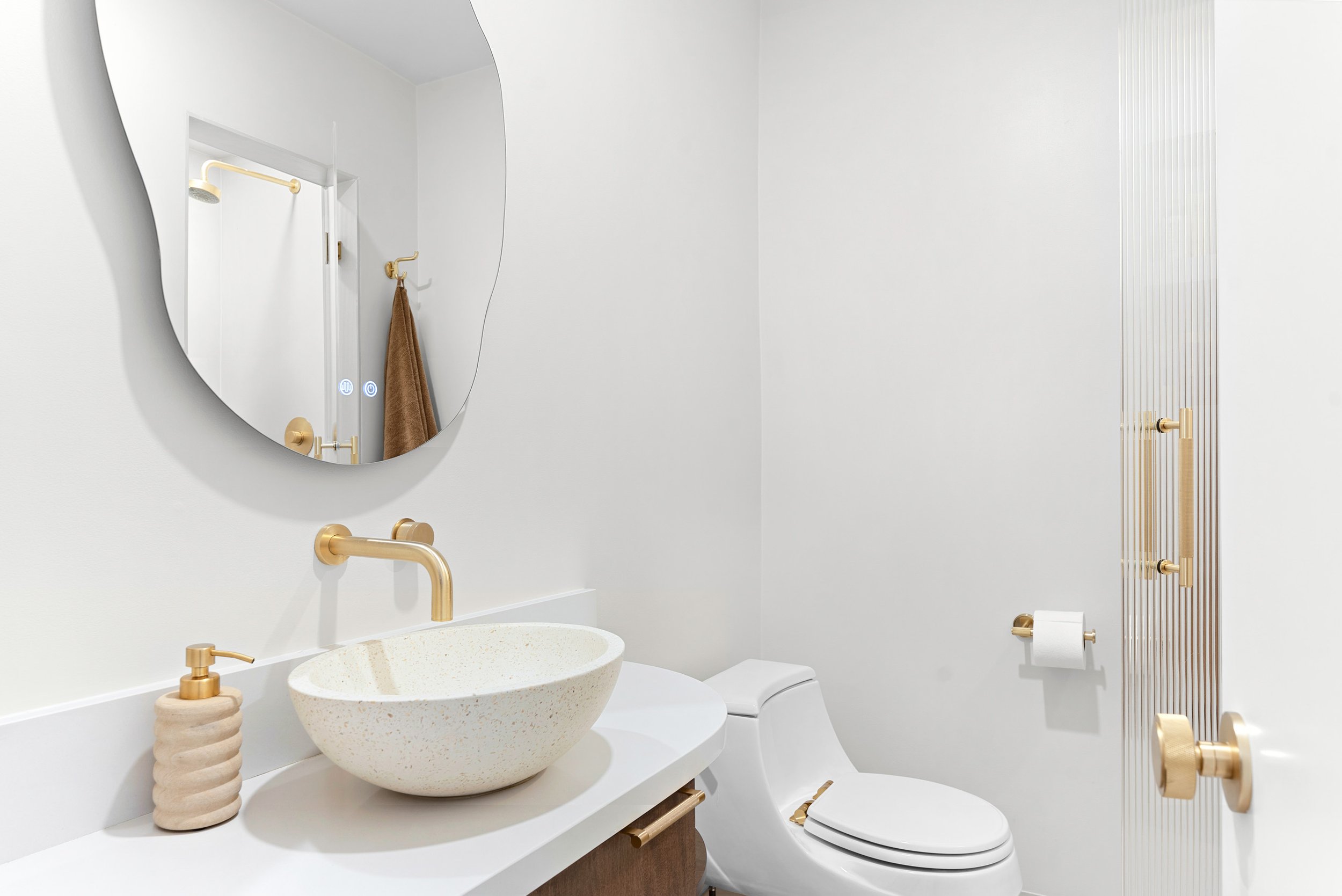 terrazzo-vessel-sink-brushed-brass-fixtures-guest-bath-la-jolla.jpg
