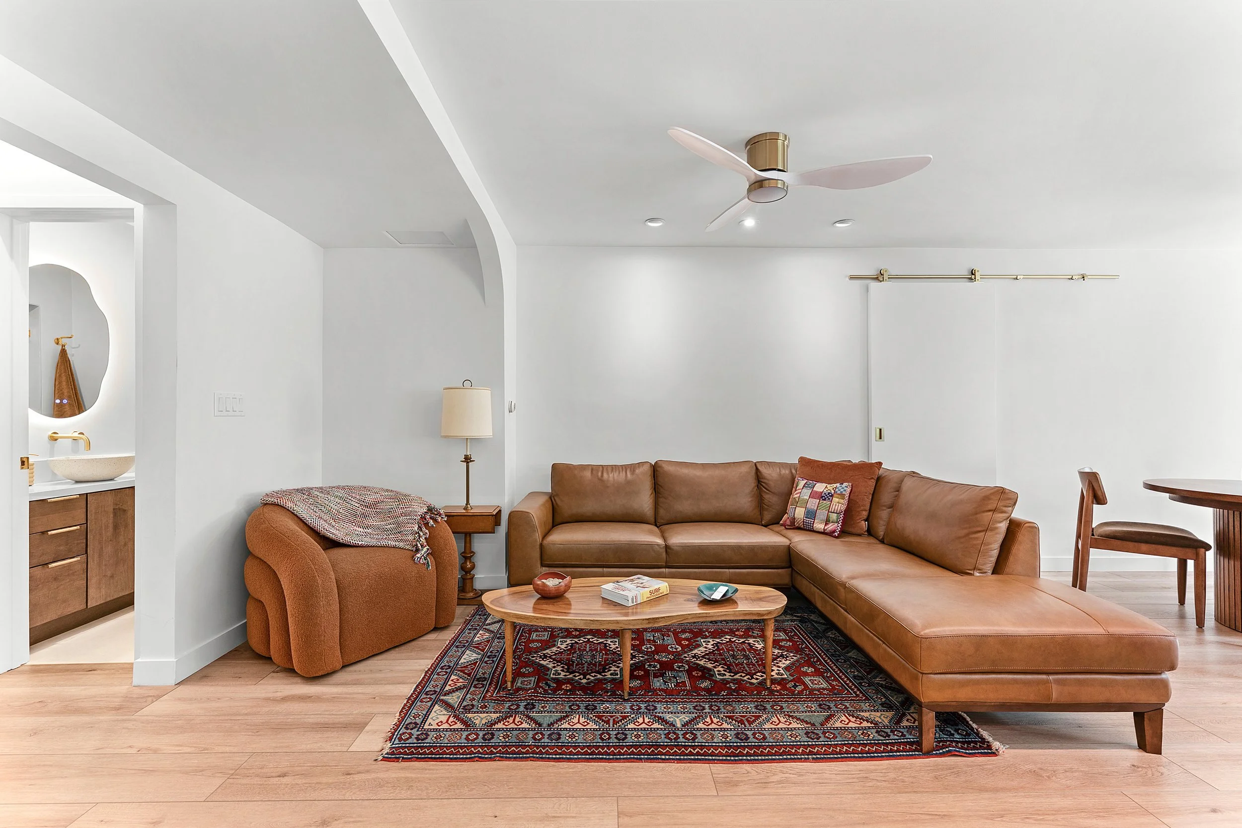 living-room-cognac-leather-sectional-la-jolla-the-designers-firm.jpg