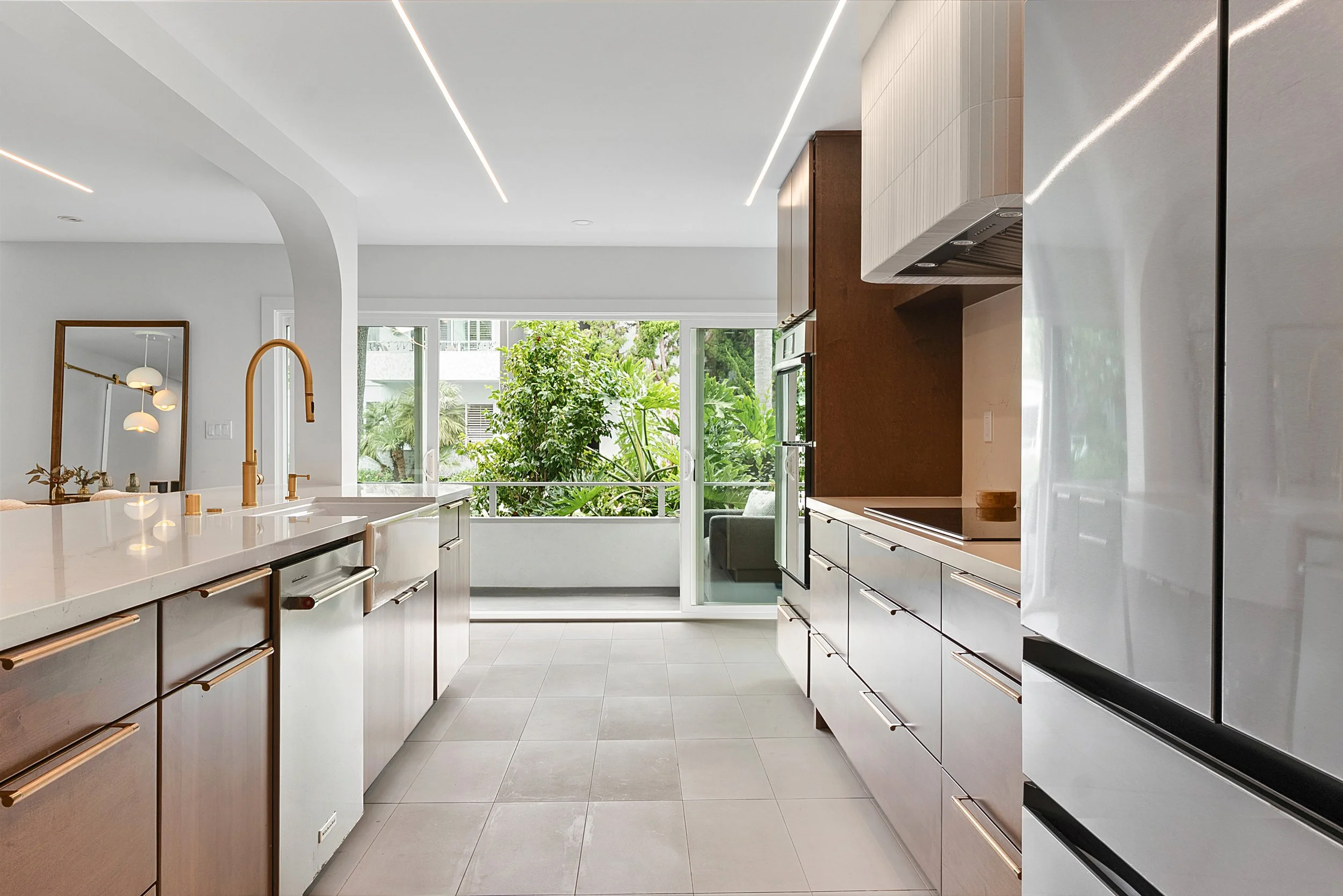 kitchen-brushed-brass-bar-pulls-wood-cabinets-la-jolla.jpg