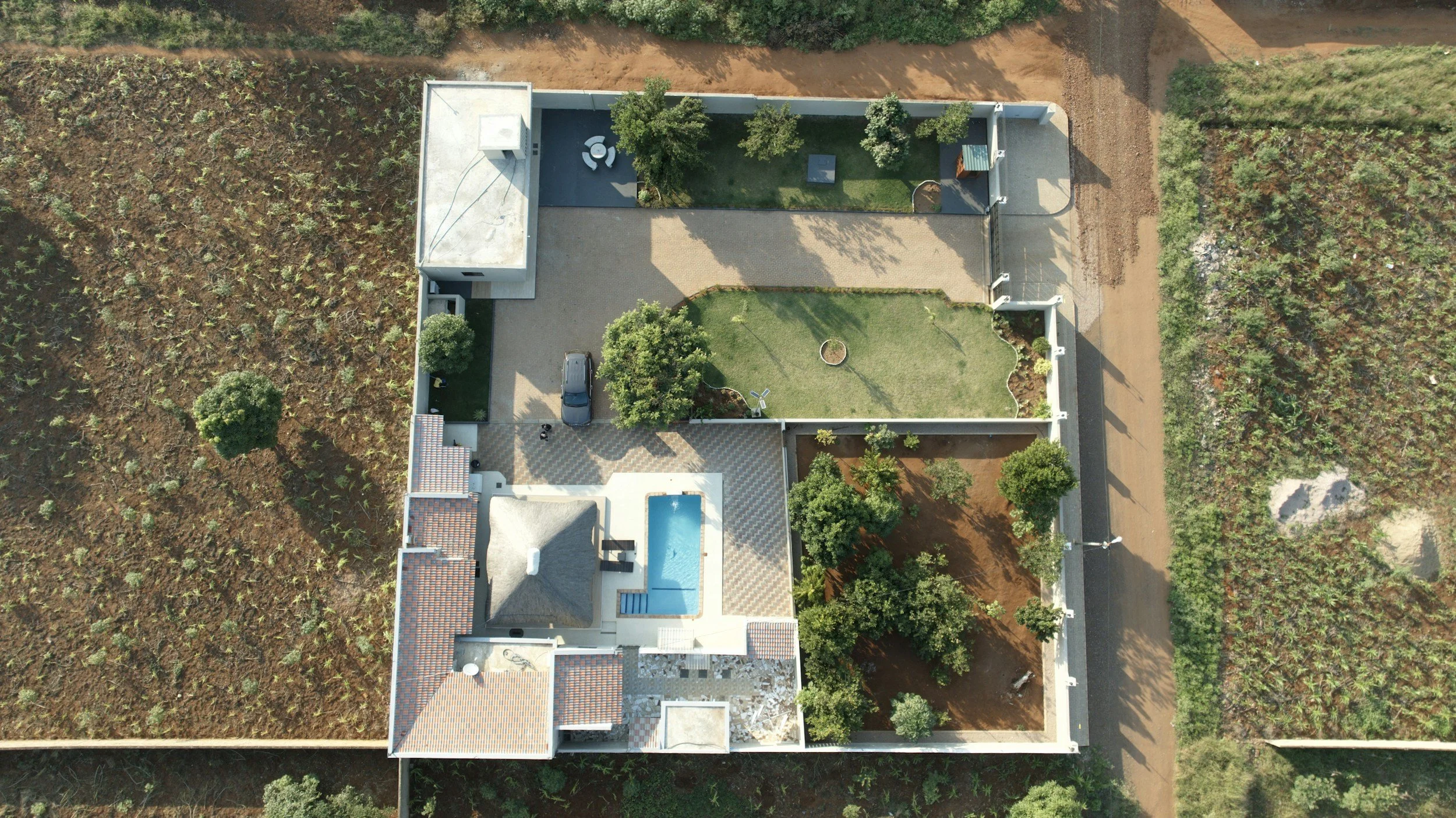 Aerial view of house and pool