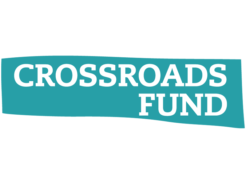 Logo for Crossroads Fund featuring the organization name in bold white text on a teal background.