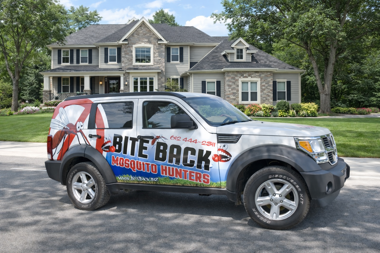The Bite Back Mosquito Hunters Original car in front of a family's home in Plymouth, MN with a mosquito free yard