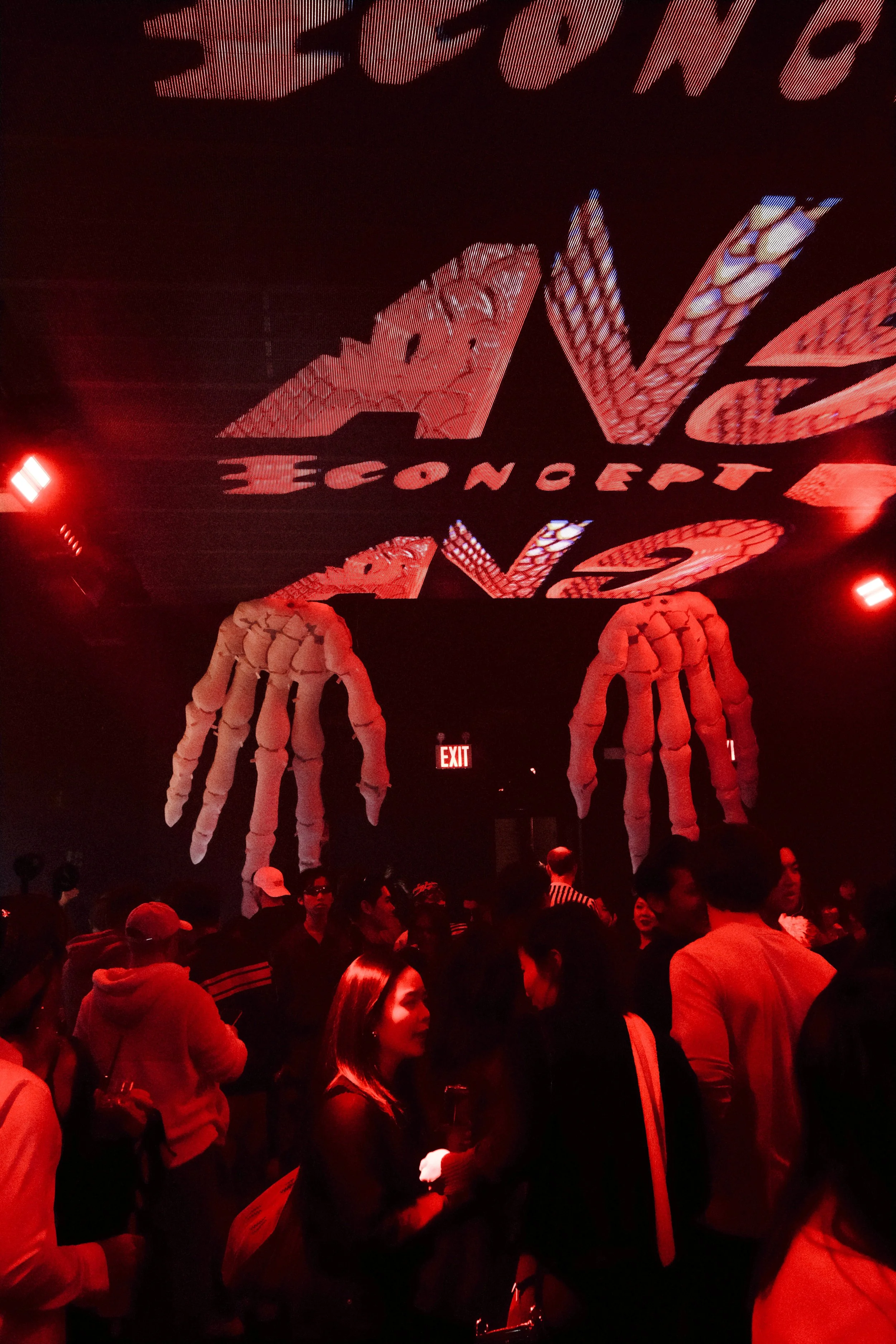 Dark indoor space of Midnight Club with experiential production agency ANG Concept's  branded VJ across the video wall for the club's grand opening Halloween party.